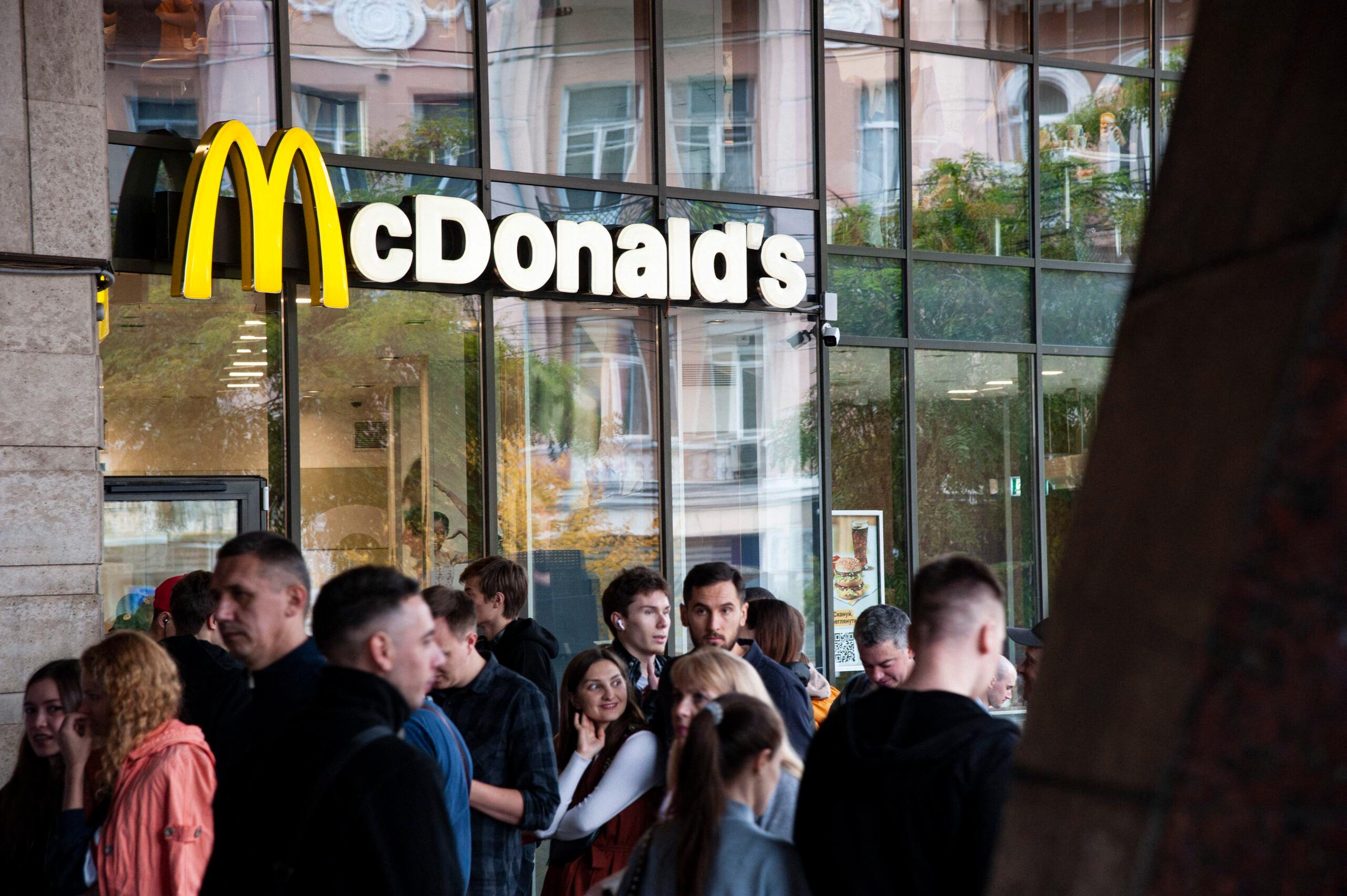 People gather outside of McDonald's