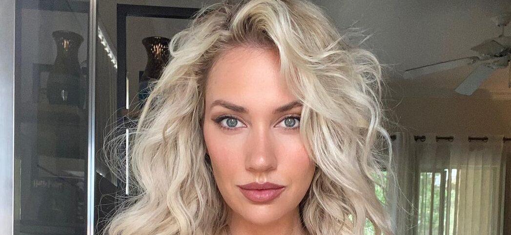 Paige Spiranac poses for the camera.