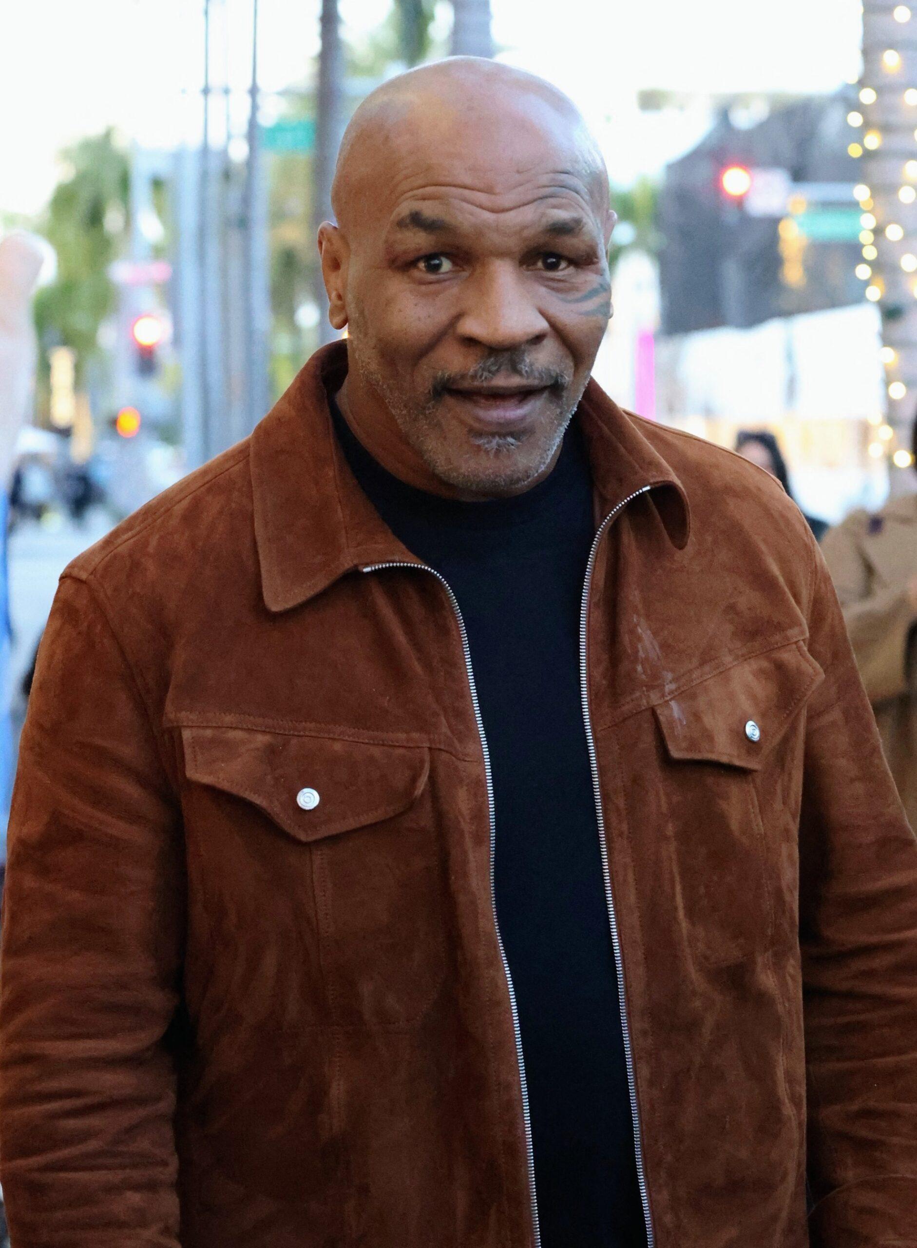 Mike Tyson seen greeting fans on Rodeo Drive after shopping Ferragamo