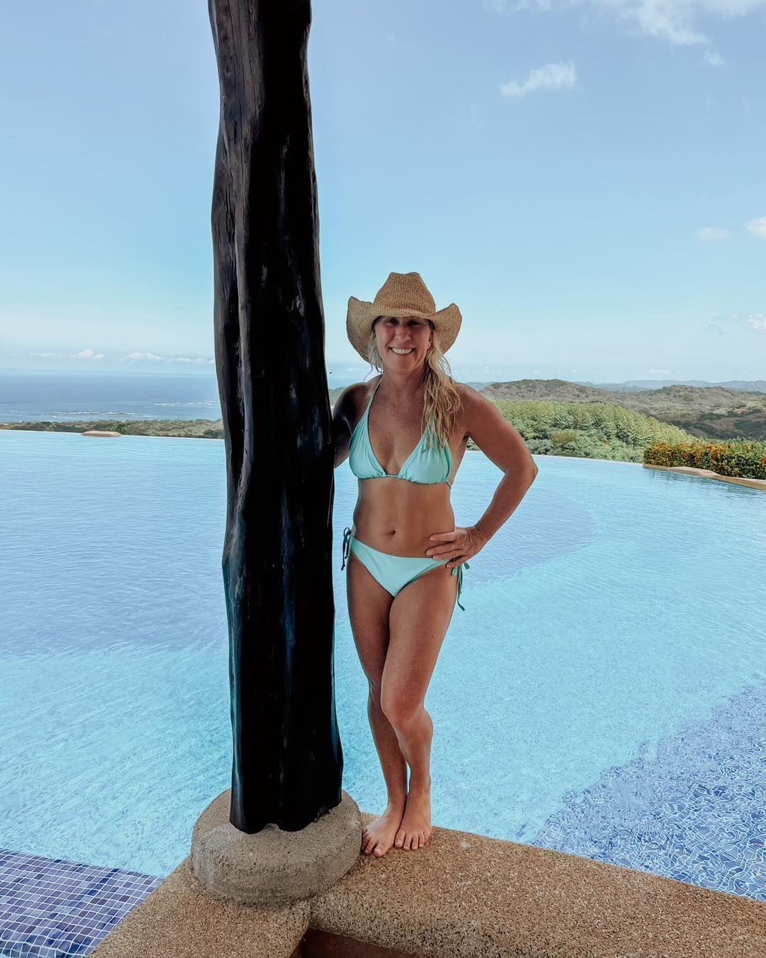 Marjorie Taylor Greene in a blue swimsuit