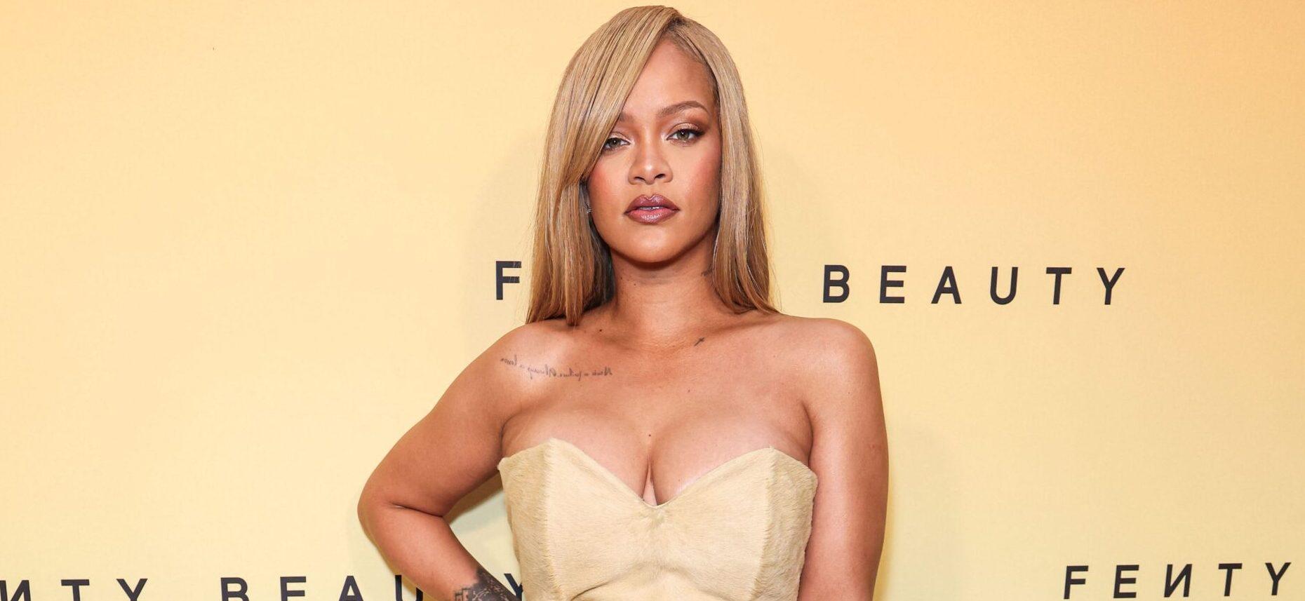 Rihanna poses on the red carpet at Rihanna x Fenty Beauty New Product Launch For Fenty Beauty Soft'Lit Naturally Luminous Longwear Foundation