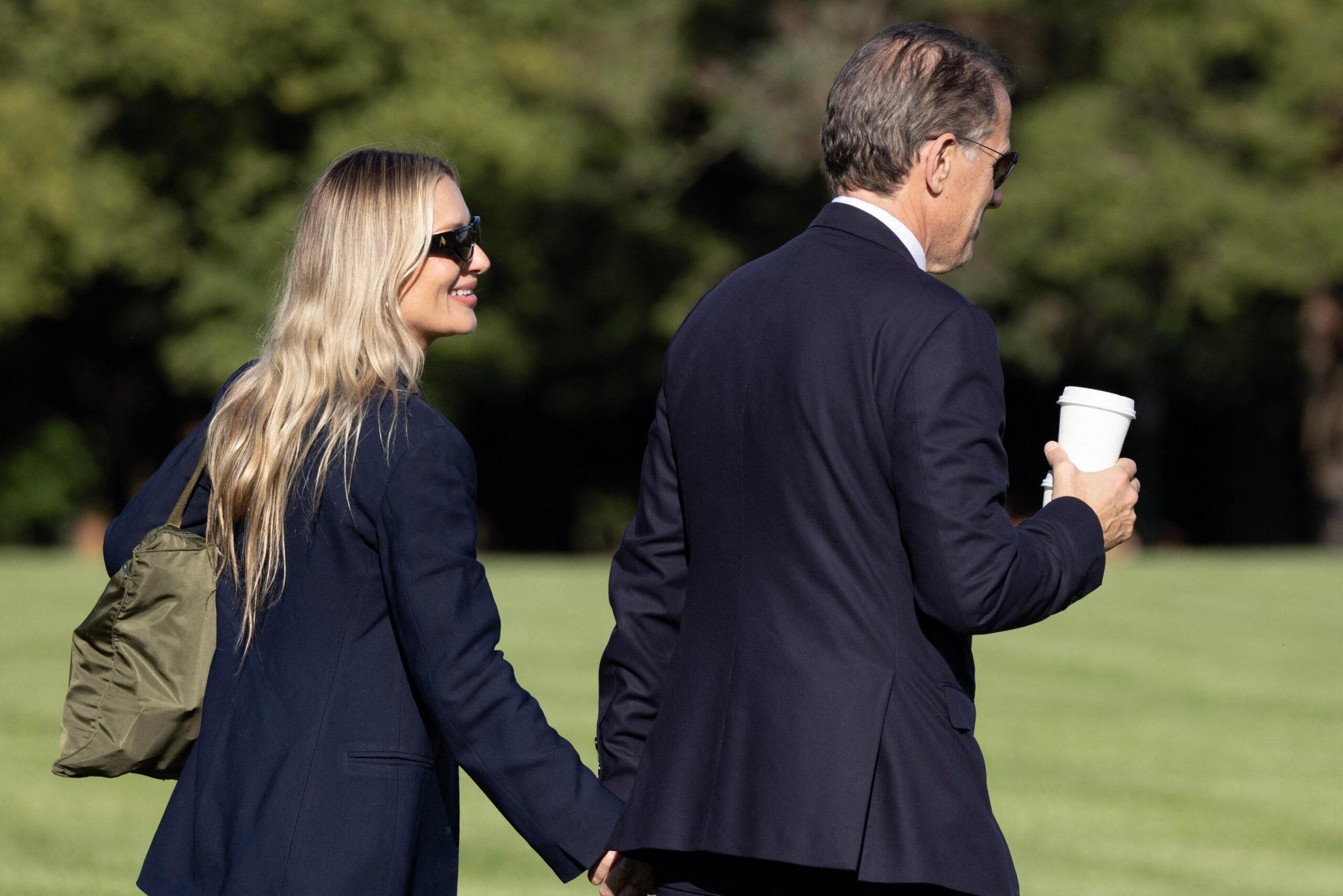 Melissa Cohen Biden holds hands with Hunter Biden