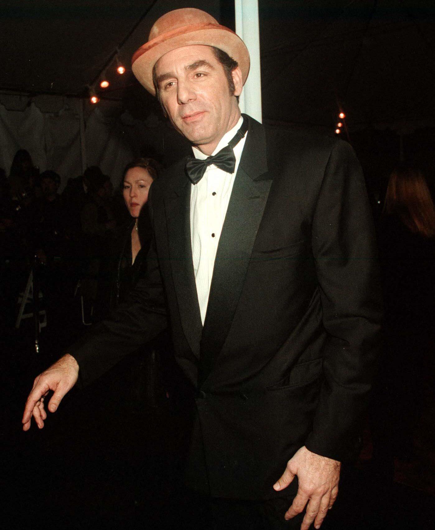 Michael Richards wearing a hat.