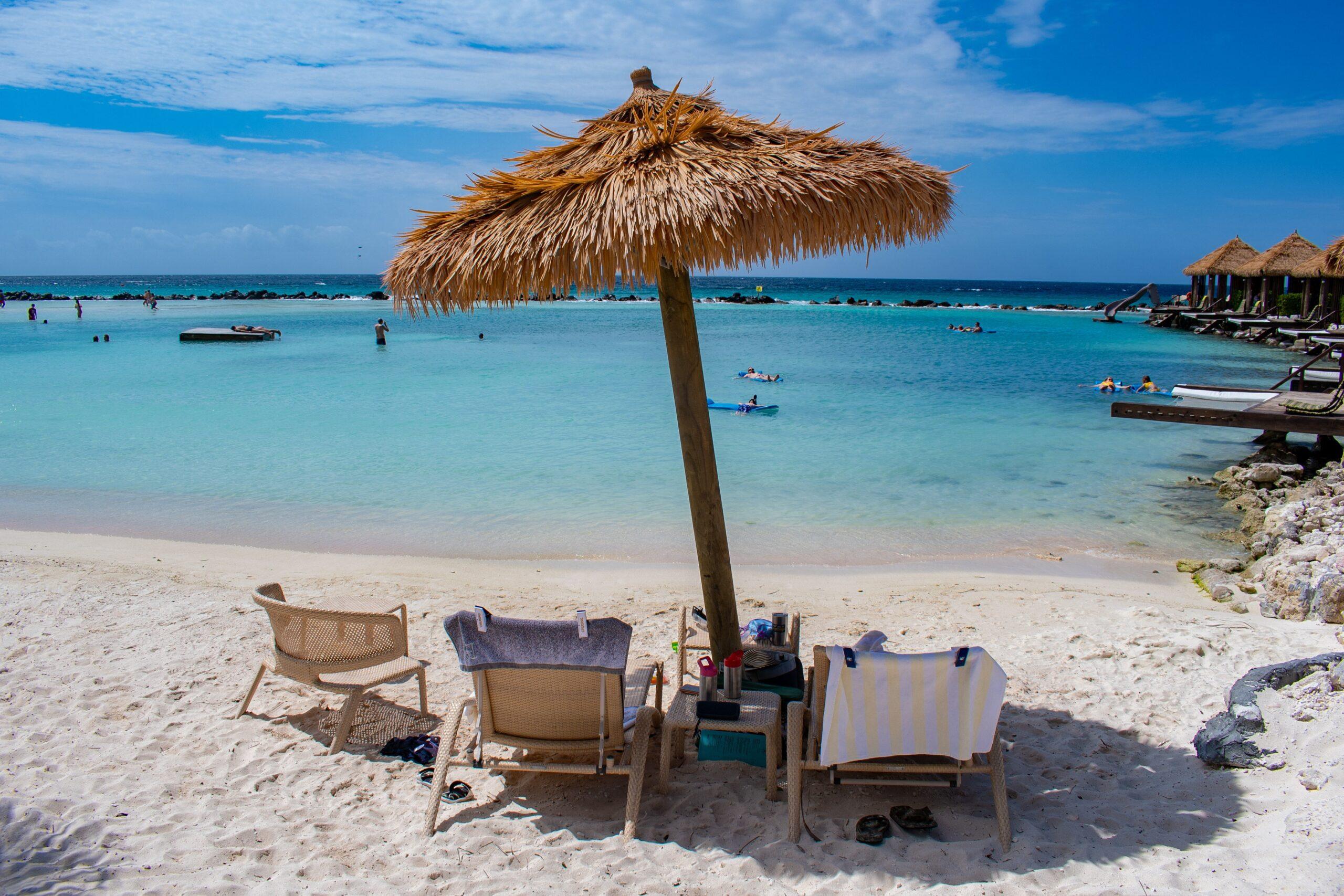 Beach chairs on private white beach