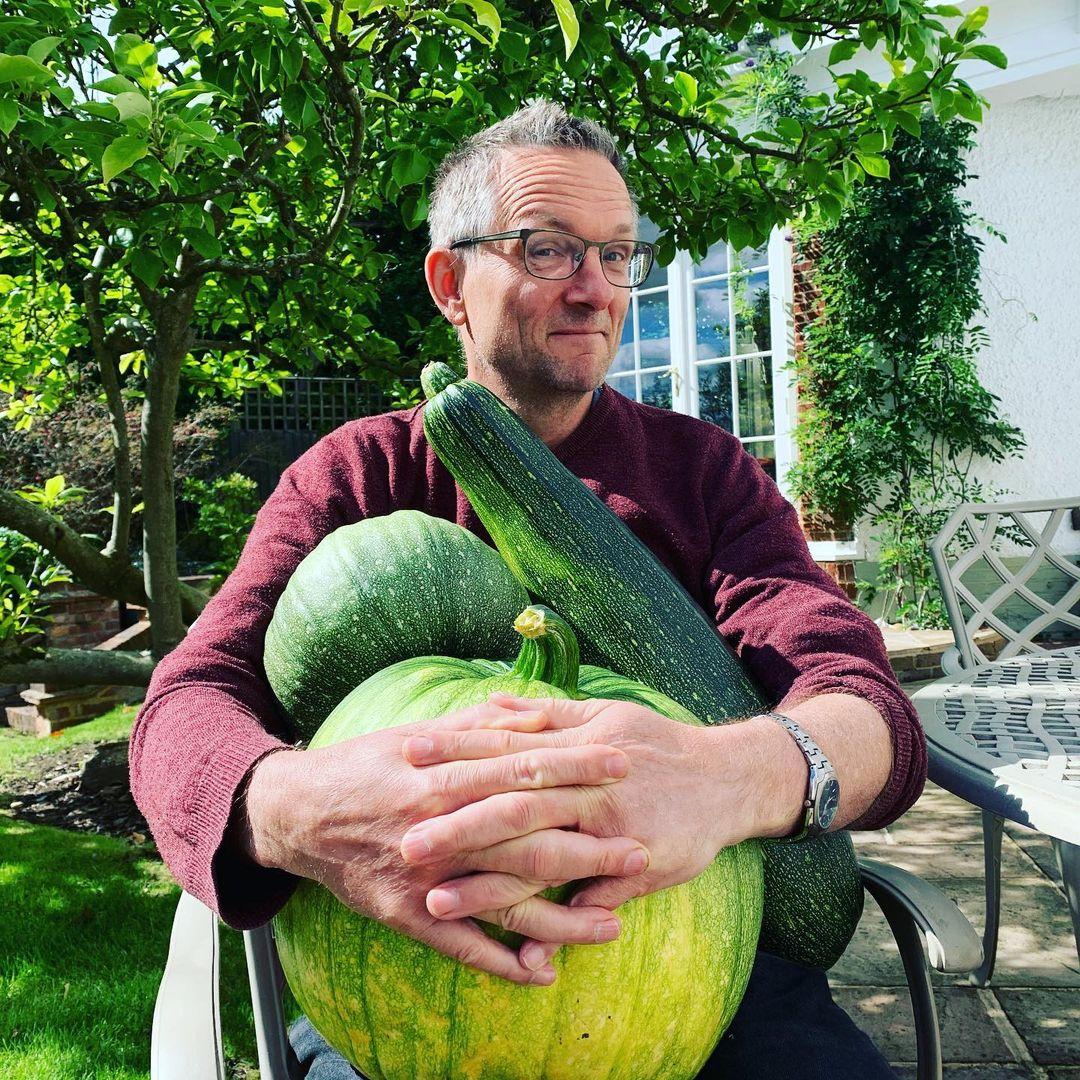 Michael Mosley holding vegetables