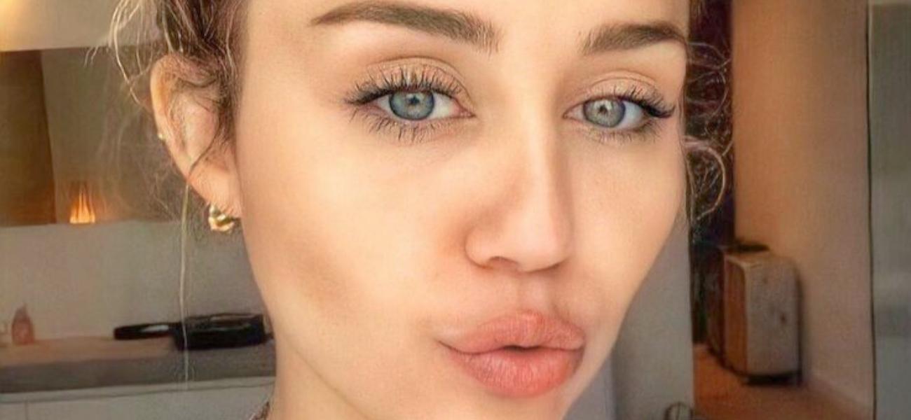 Miley Cyrus Highlights Bikini Tan Lines In Braless Beach Dress