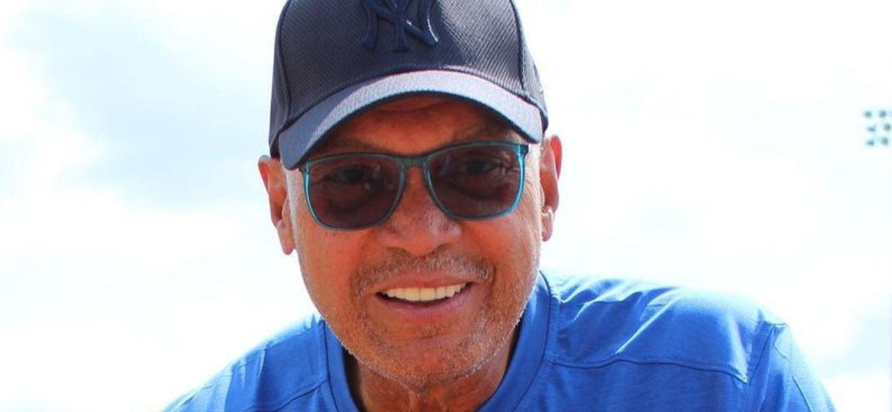 Reggie Jackson smiling in New York Yankees hat