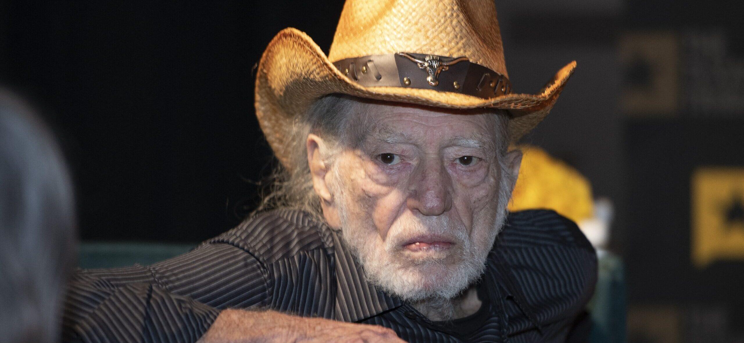 Willie Nelson wearing a cowboy hat