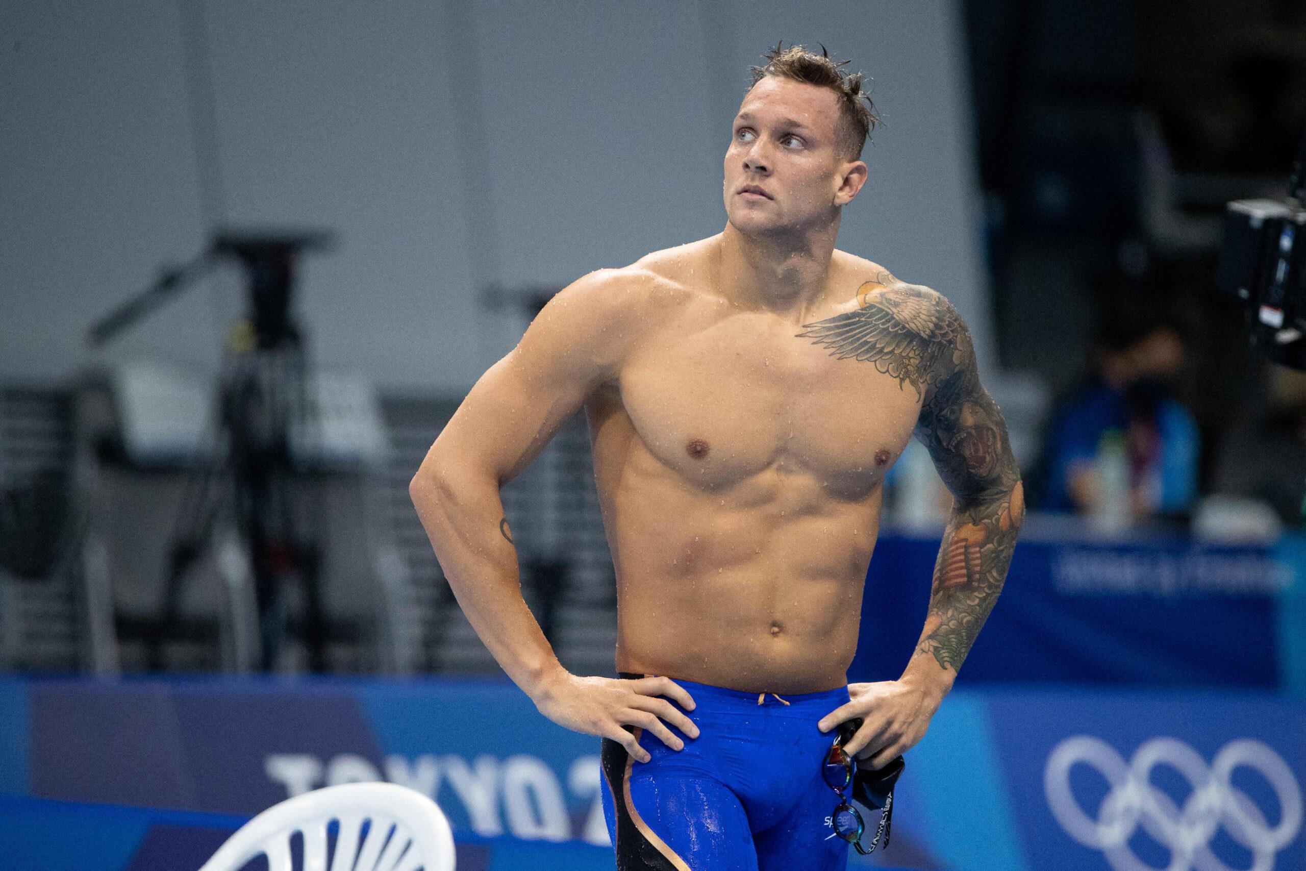 Caeleb Dressel of (USA) looks at scoreboard after swimming in the Men's 100m Freestyle Semifinal 