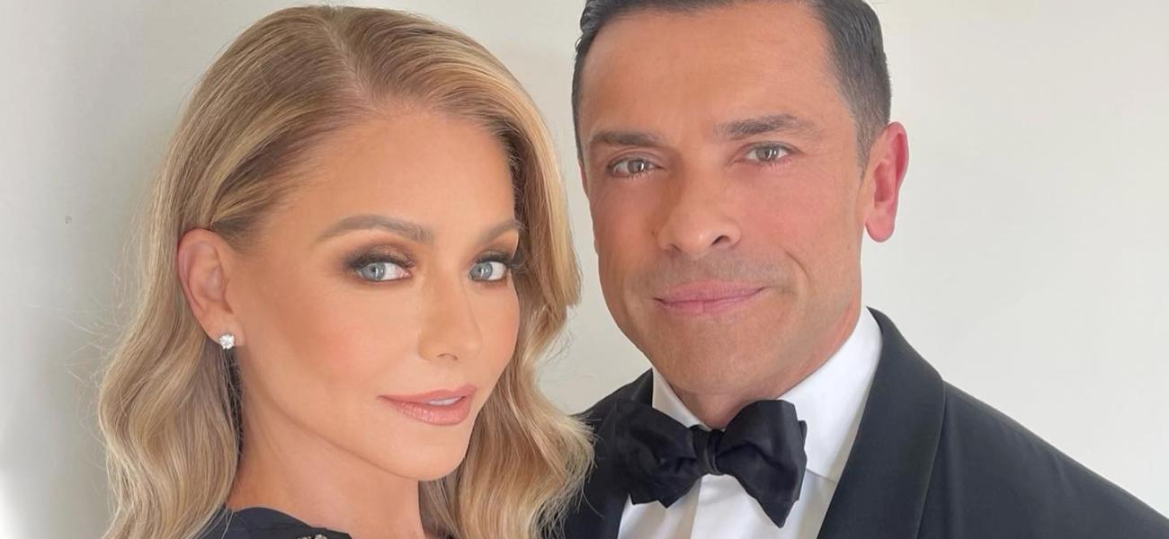 Kelly Ripa and Mark Consuelos pose together