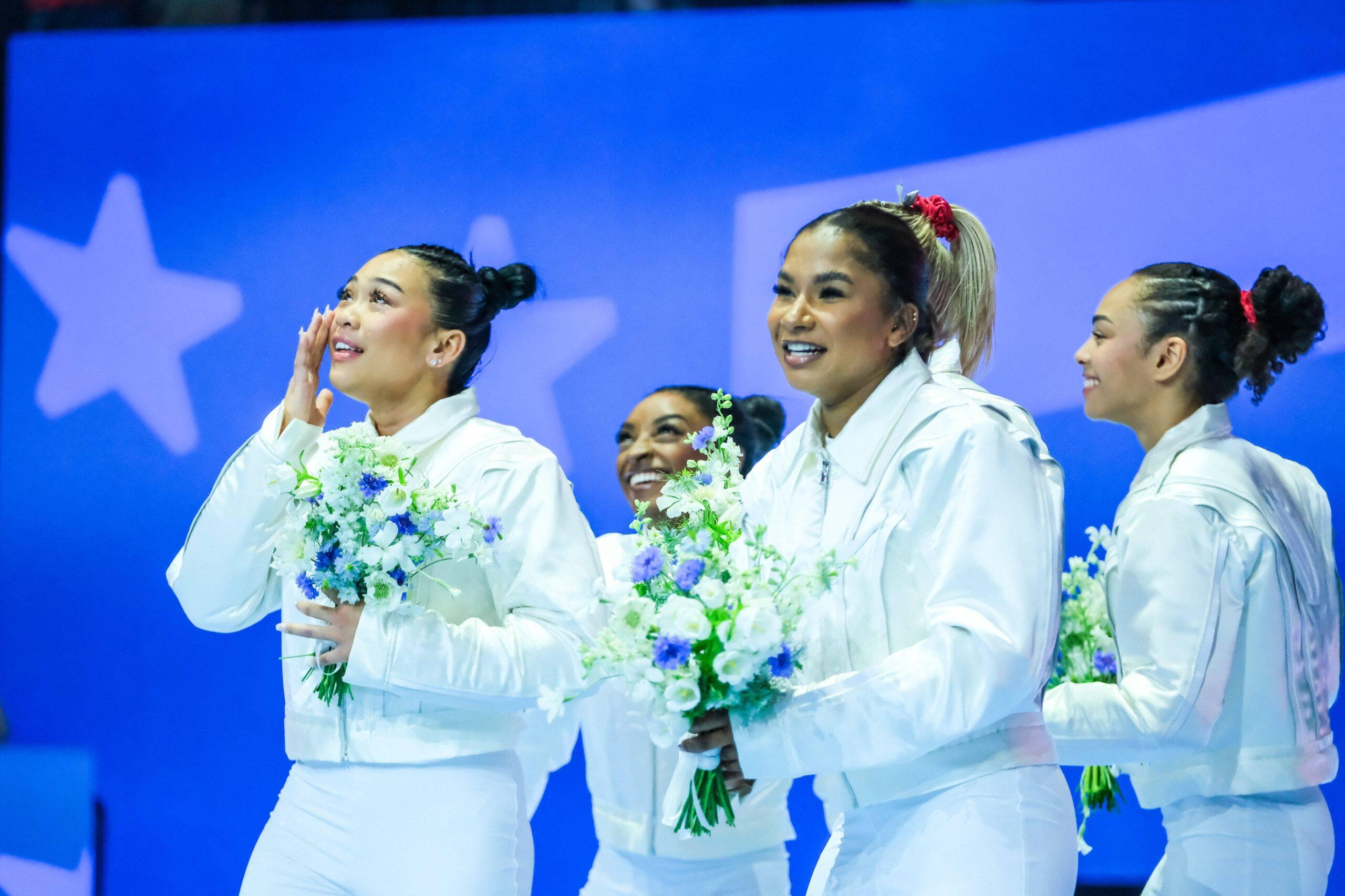 Simone Biles, Suni Lee, and Jordan Chiles celebrating making Team USA for 2024 Paris Olympics