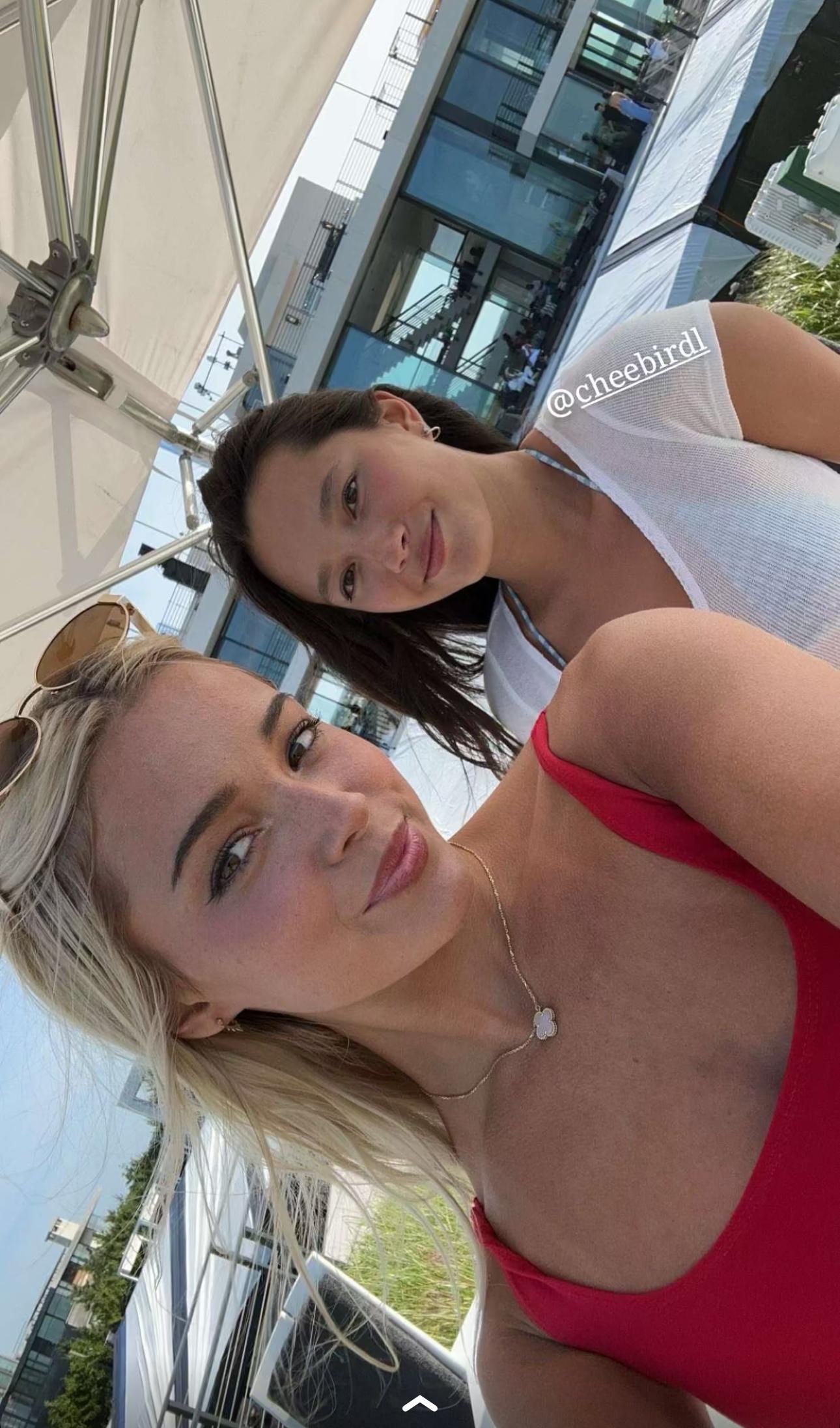 Olivia Dunne snaps a selfie with Lily Chee.