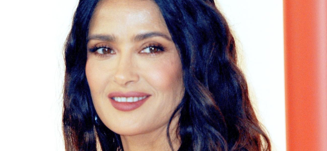 Salma Hayek smiles at an event