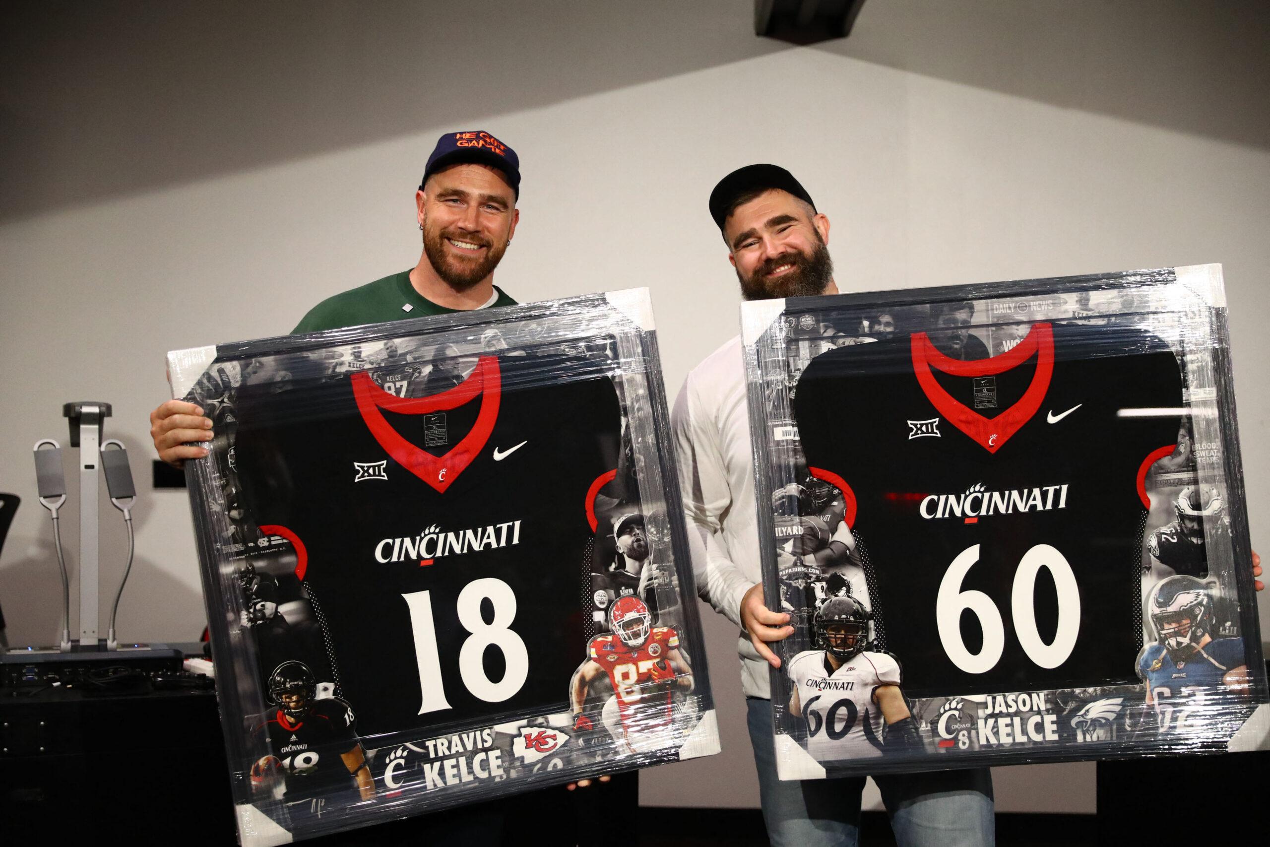 Travis and Jason Kelce surprised with graduation ceremony after New Heights Live show at University of Cincinnati