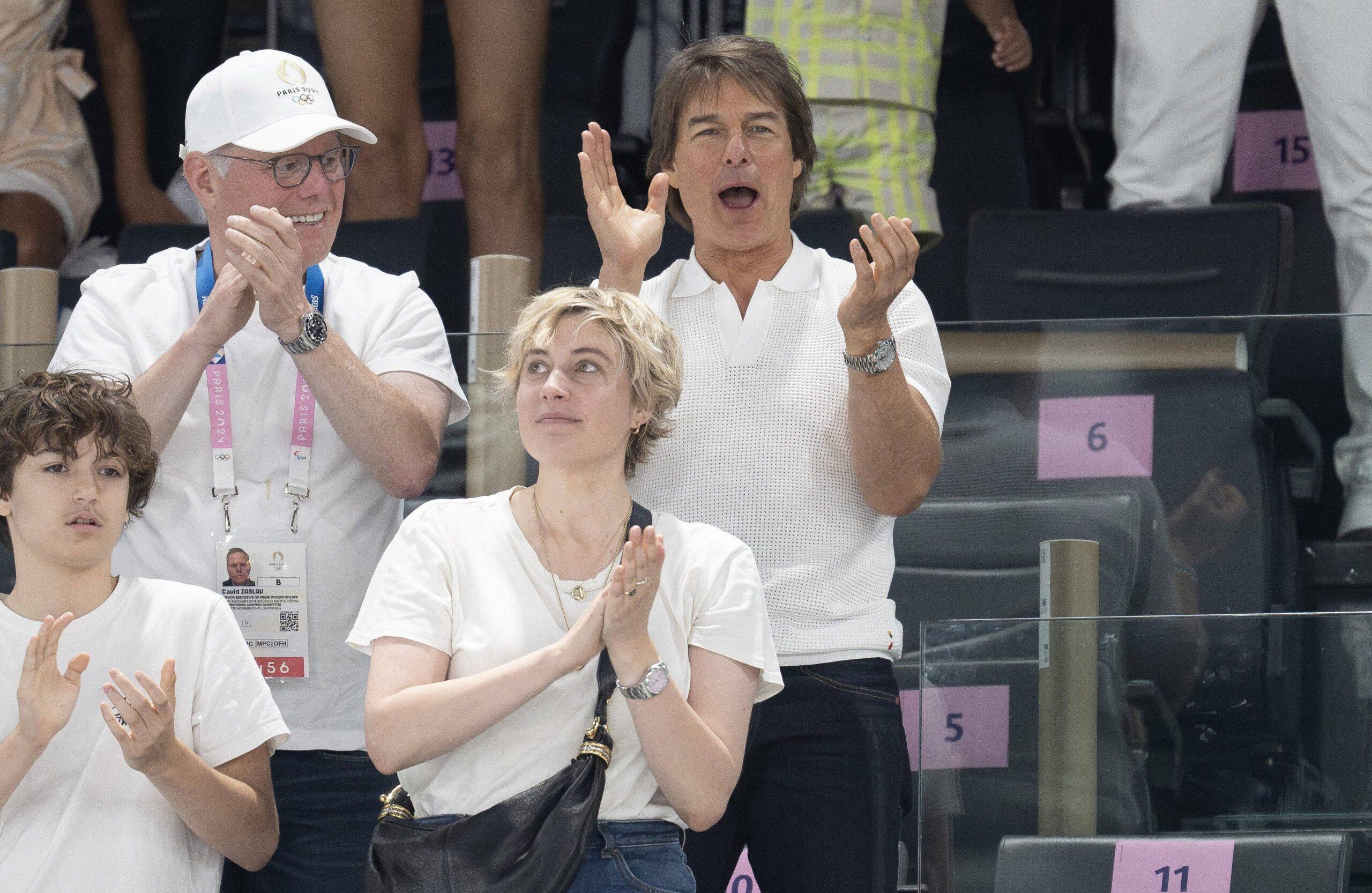 Tom Cruise watching Simone Biles in the gymnastics with his daughter Isabella