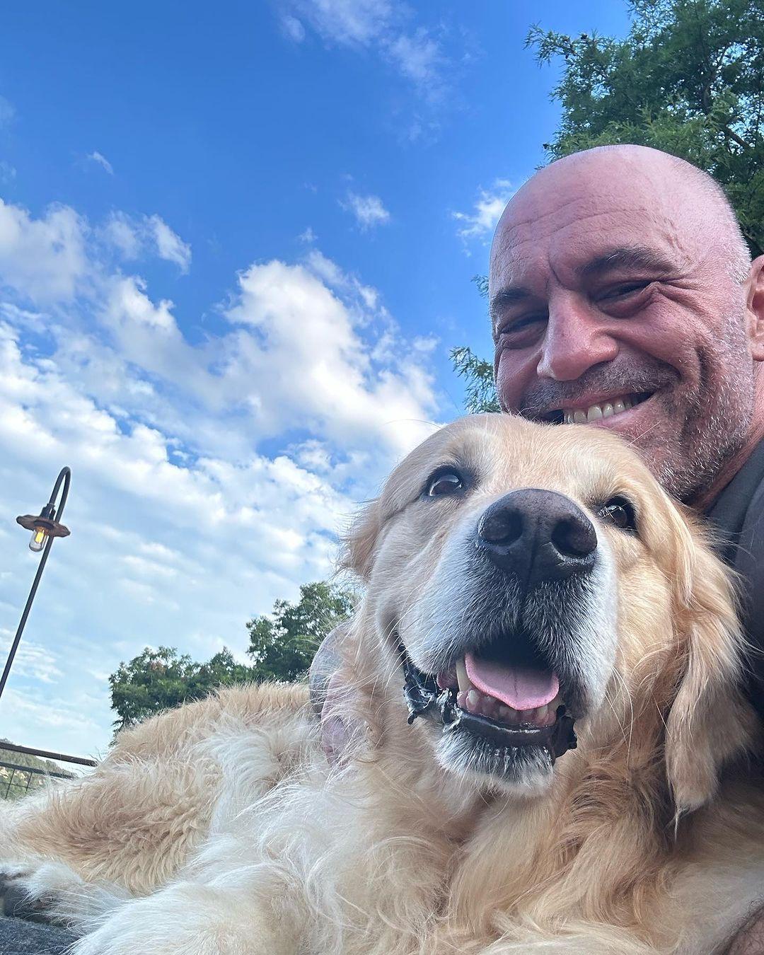 Joe Rogan takes a selfie with his dog