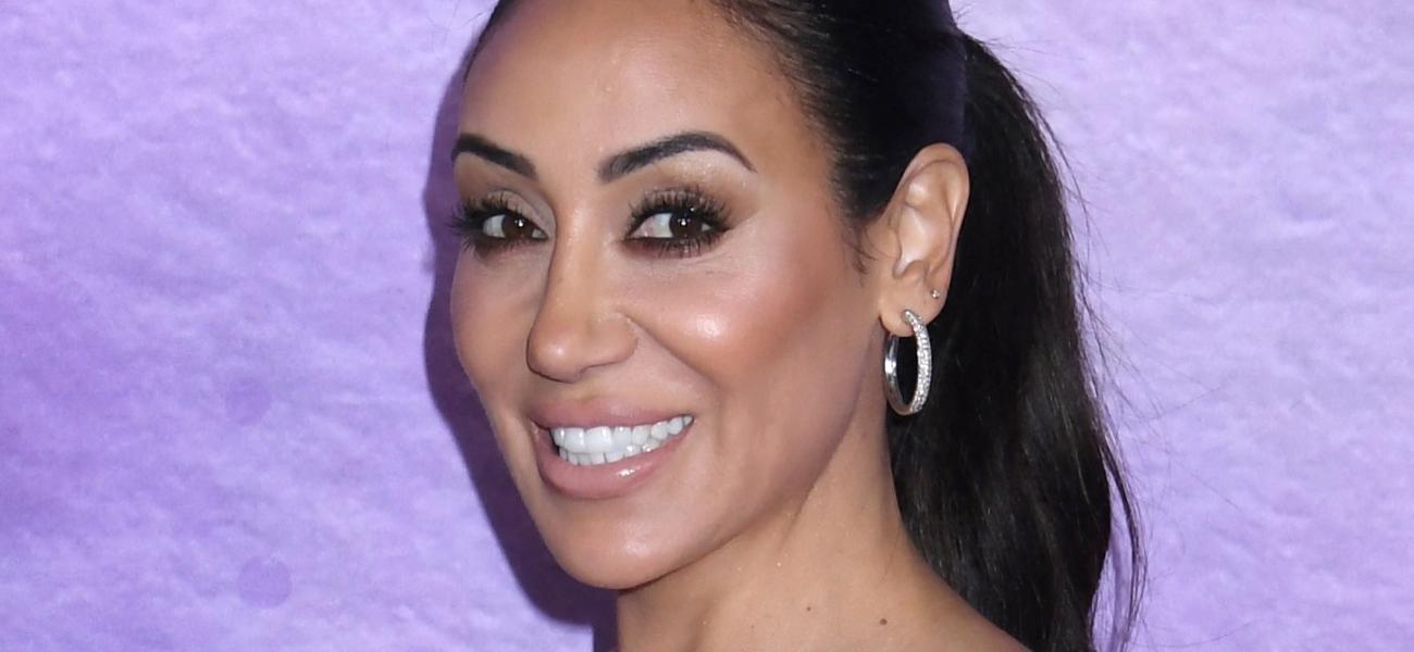 Melissa Gorga smiling at an event