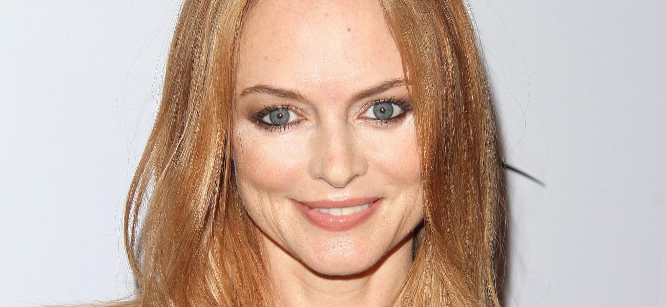 Heather Graham smiles at an event