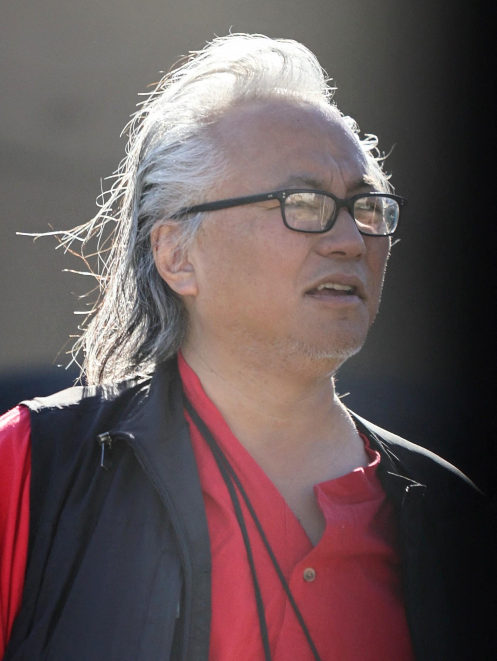 Matthew Perry's longtime assistant Kenny Iwamasa spotted at his $6 million LA mansion for the FIRST time since tragic actor was found dead, amid reports HE may have discovered the body.