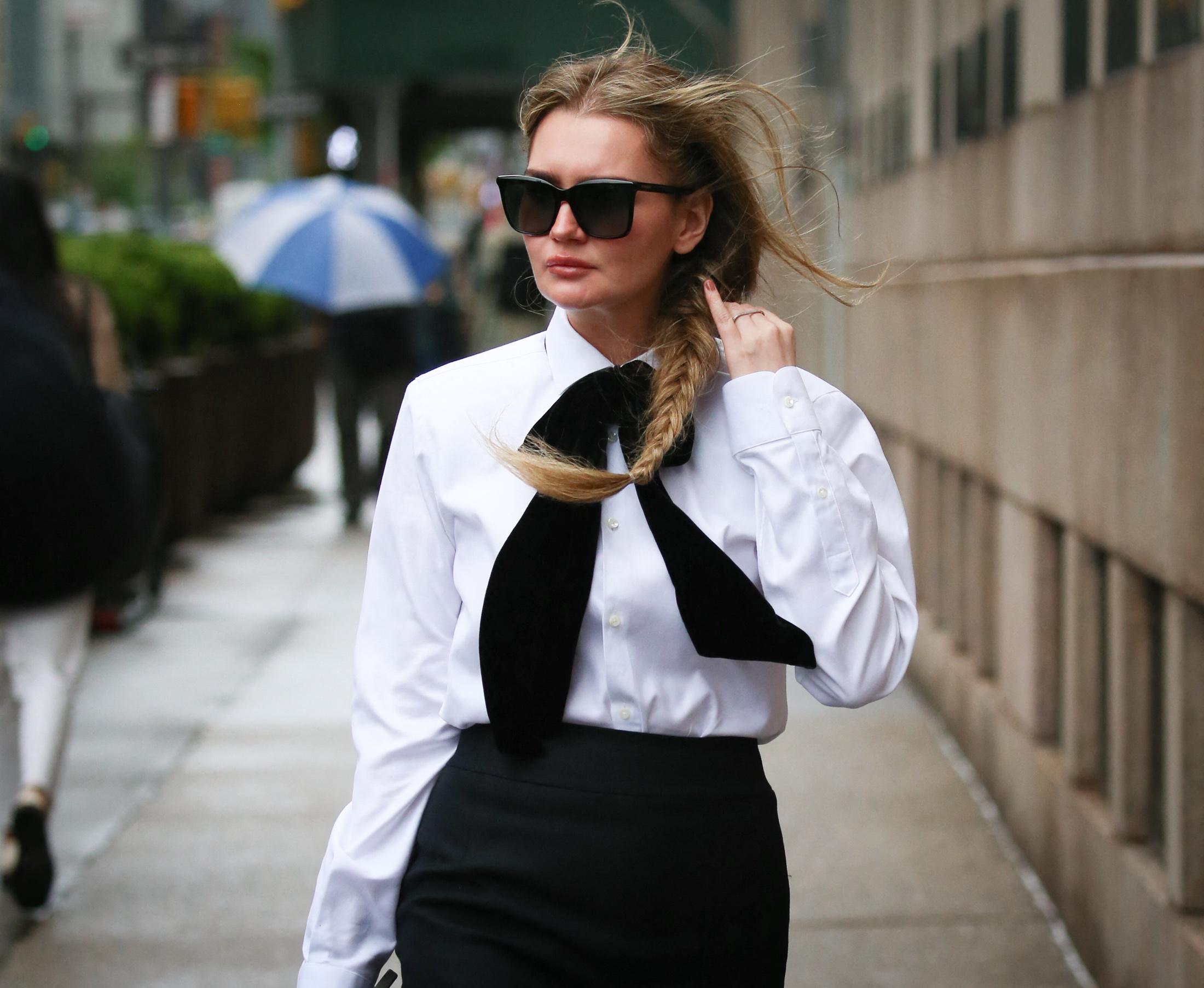 Anna Delvey arrives to her Court appearance in New York City in a powerful fashion statement outfit.