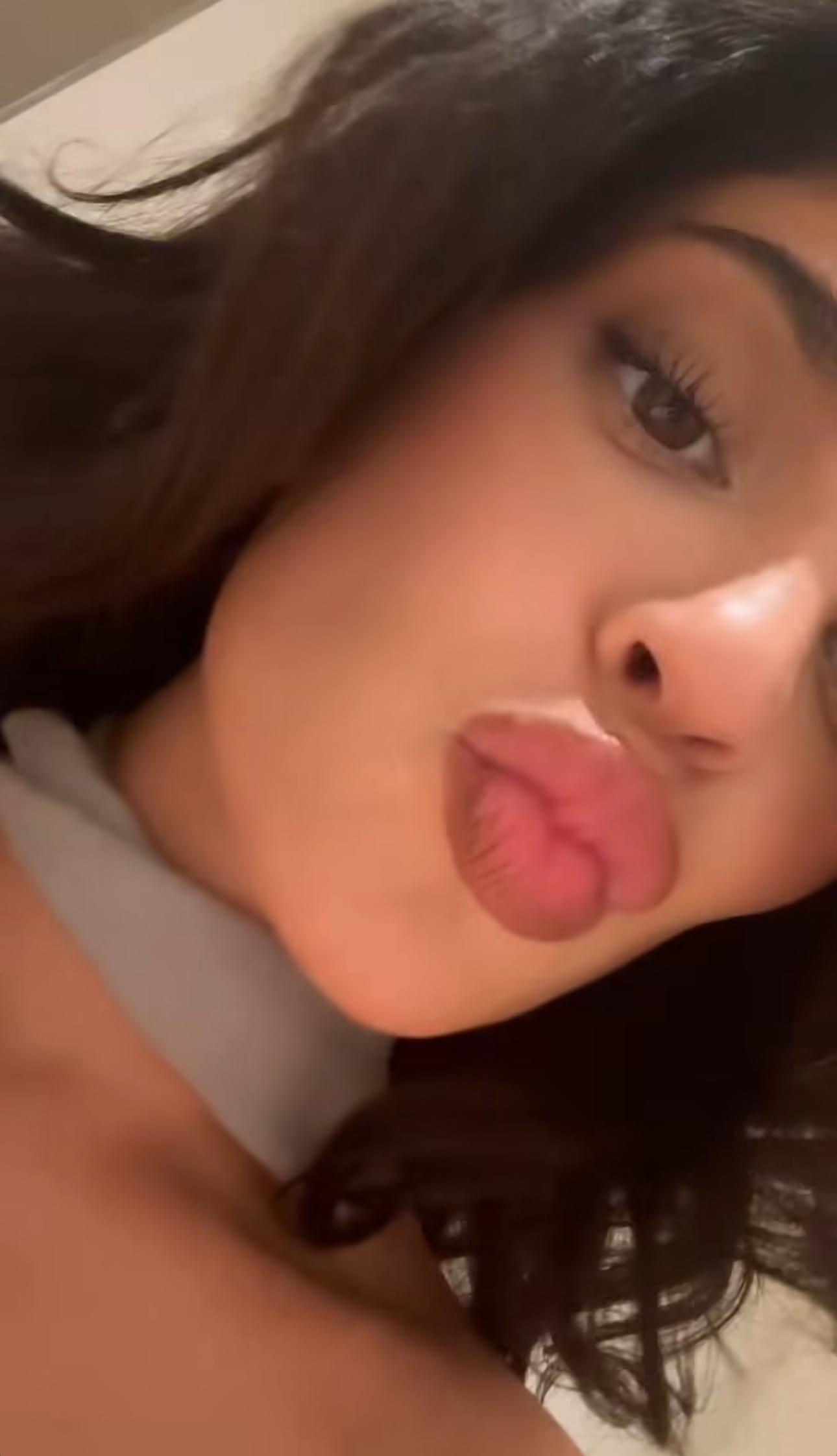 Kylie Jenner films a video of herself.