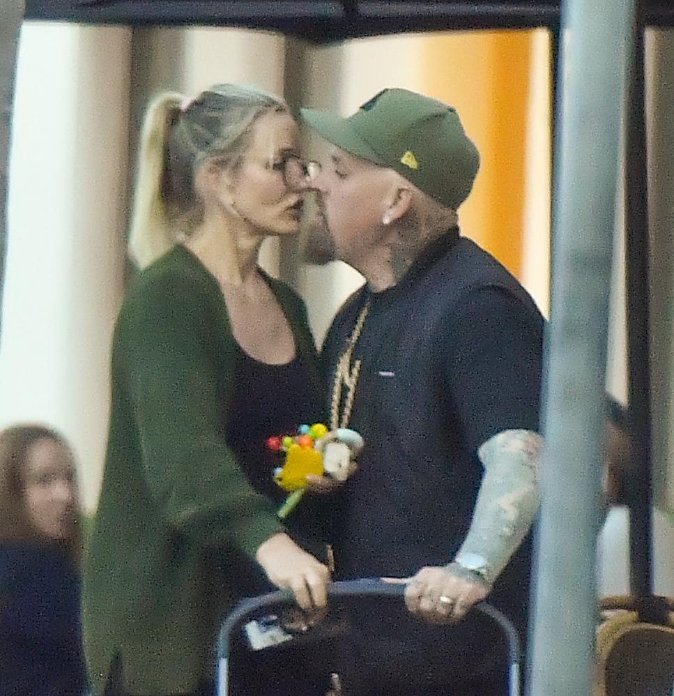 Cameron Diaz and husband Benji Madden share a sweet kiss