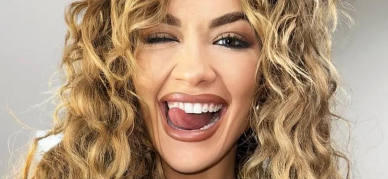 Rita Ora Celebrates McDonald’s In Tight Braless Minidress