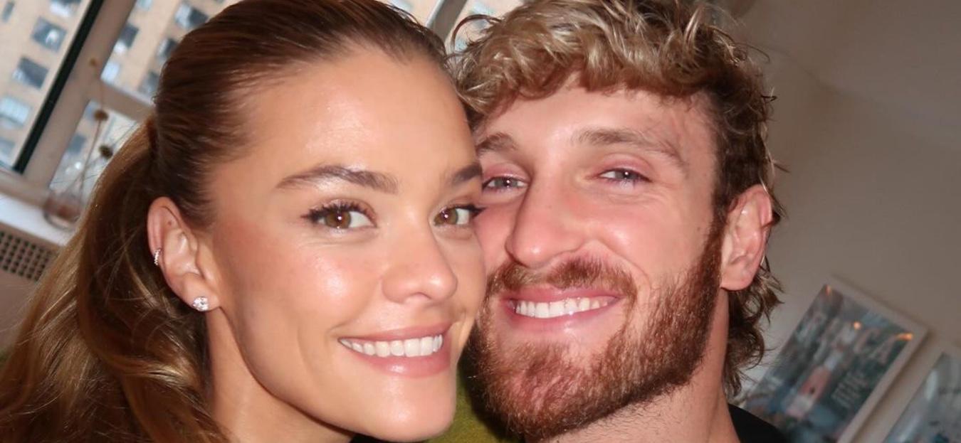 Nina Agdal and Logan Paul smile for the camera.