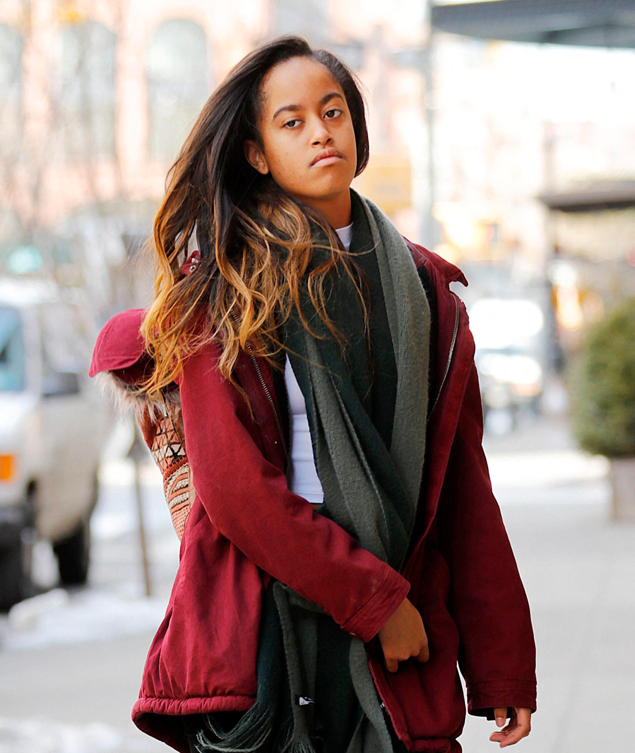 Malia Obama at Stylish former first daughter Malia Obama heads to work in New York wearing a red jacket and a super long scarf