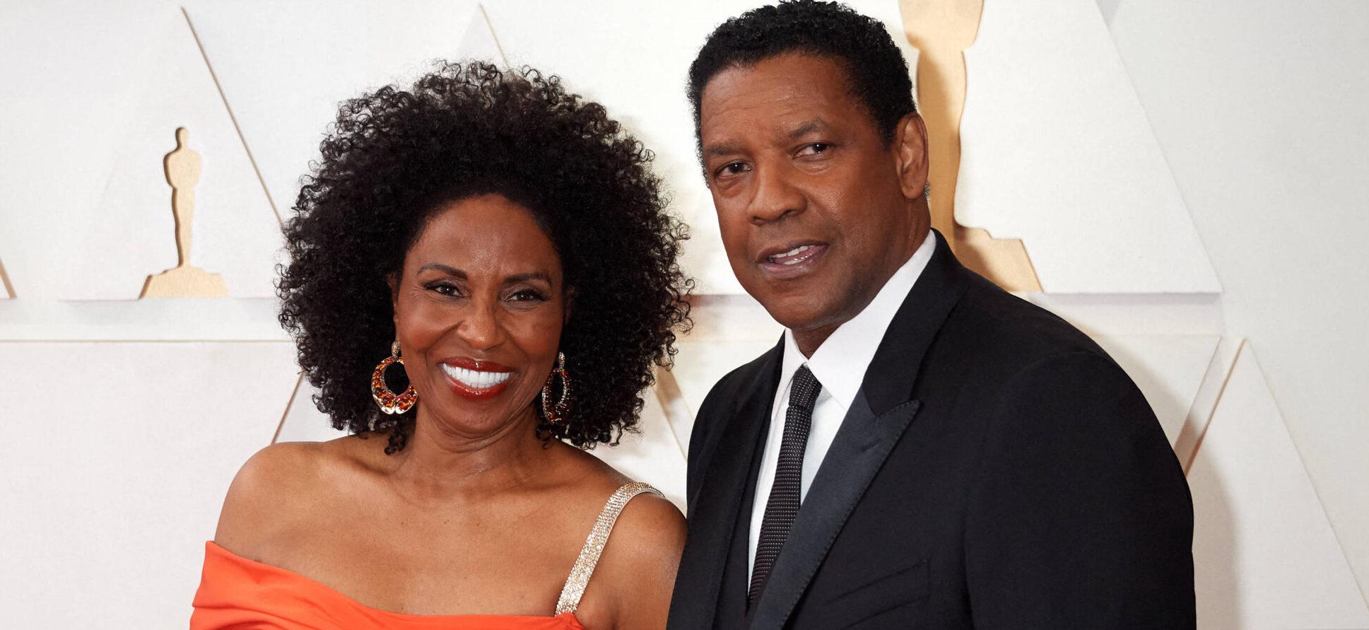 Pauletta Washington and Denzel Washington pose together at Oscars 2022