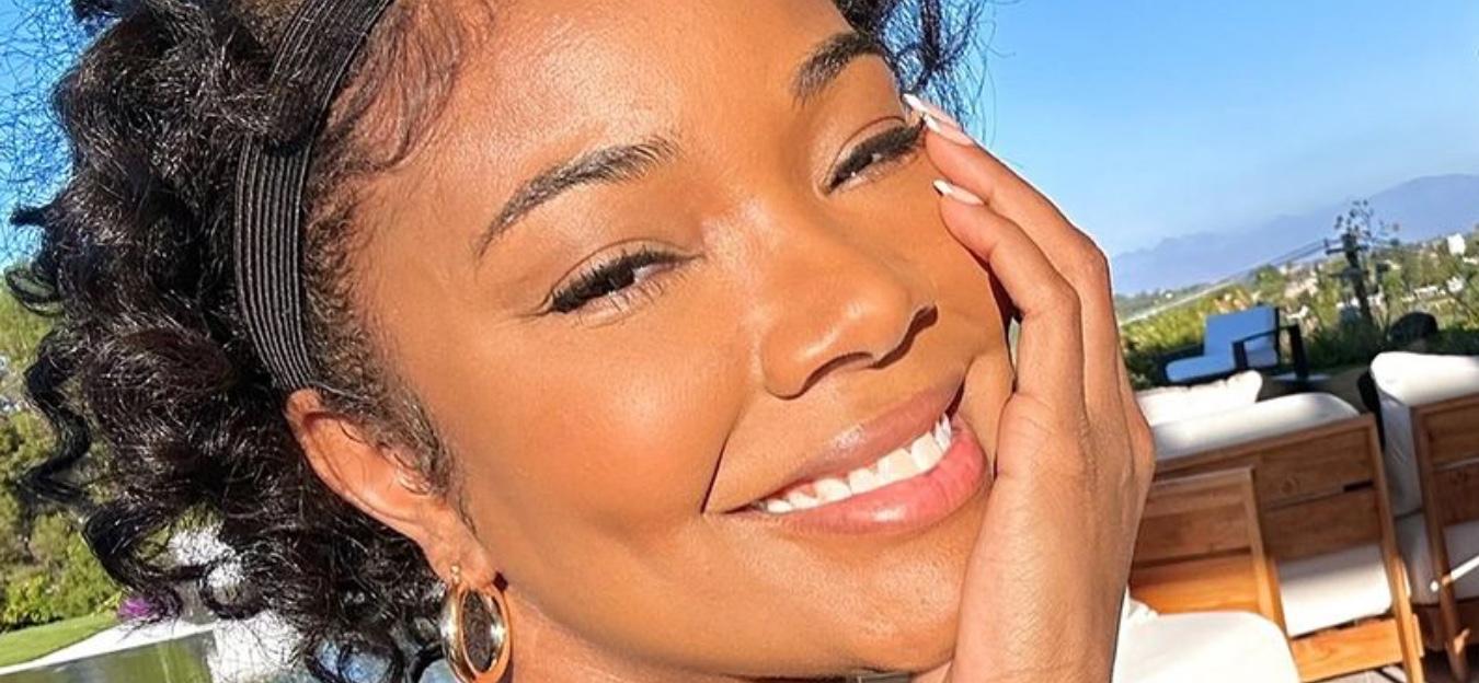 Gabrielle Union flashes smile in a selfie.