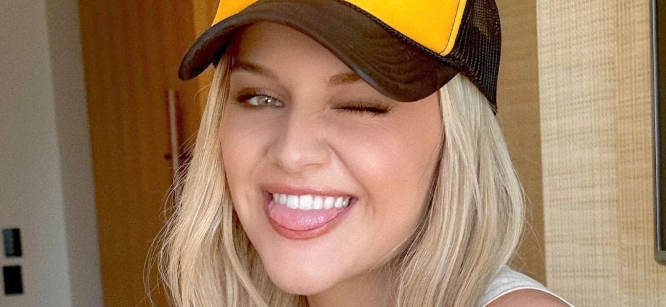 Kelsea Ballerini winking close up