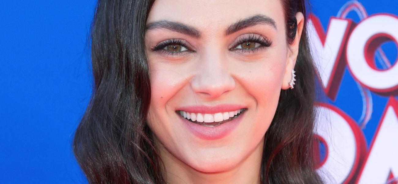 Mila Kunis smiling close up