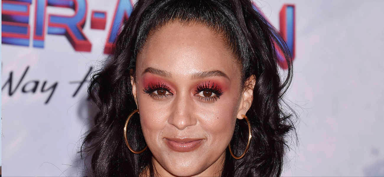 Tia Mowry at Spiderman premiere banner