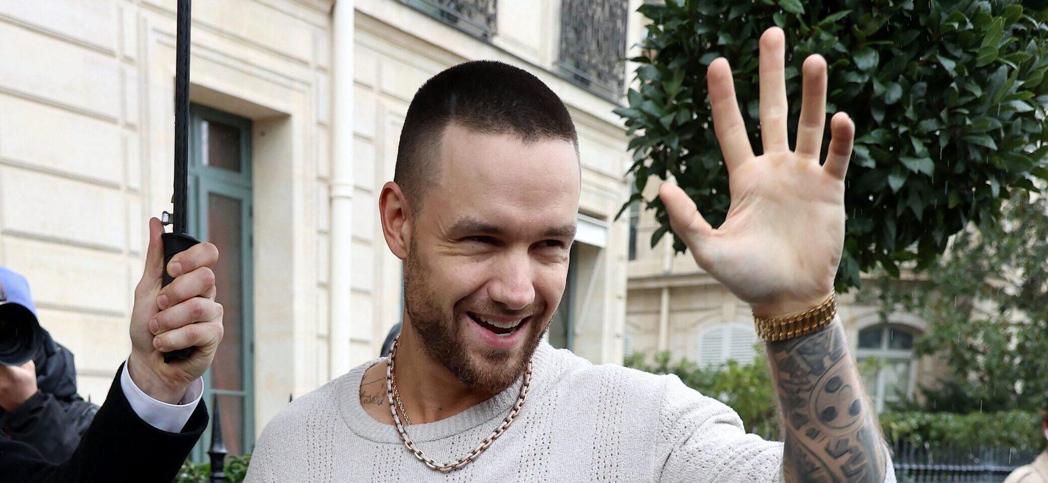 Liam Payne waving