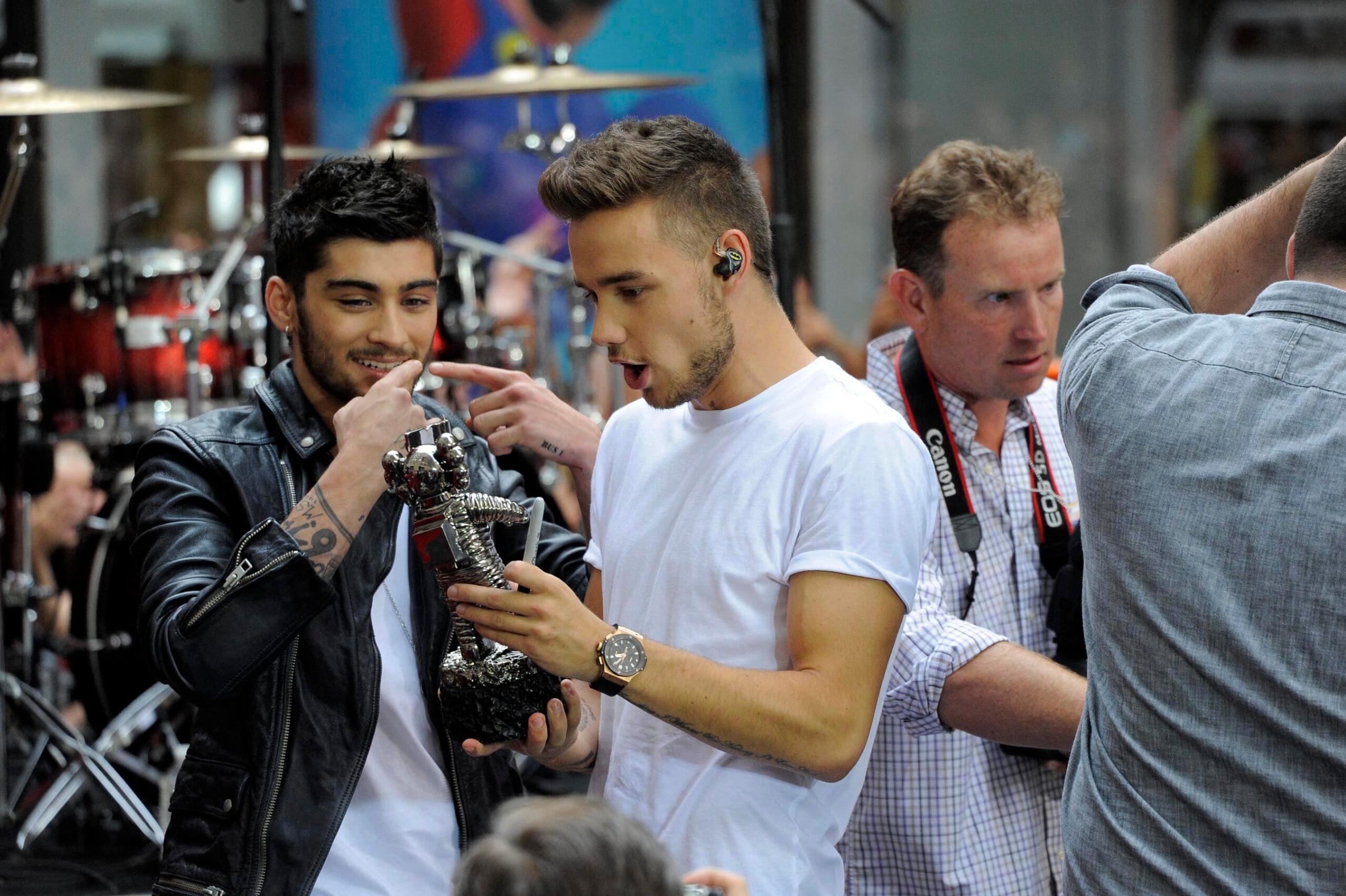 Zayn Malik and Liam Payne on stage