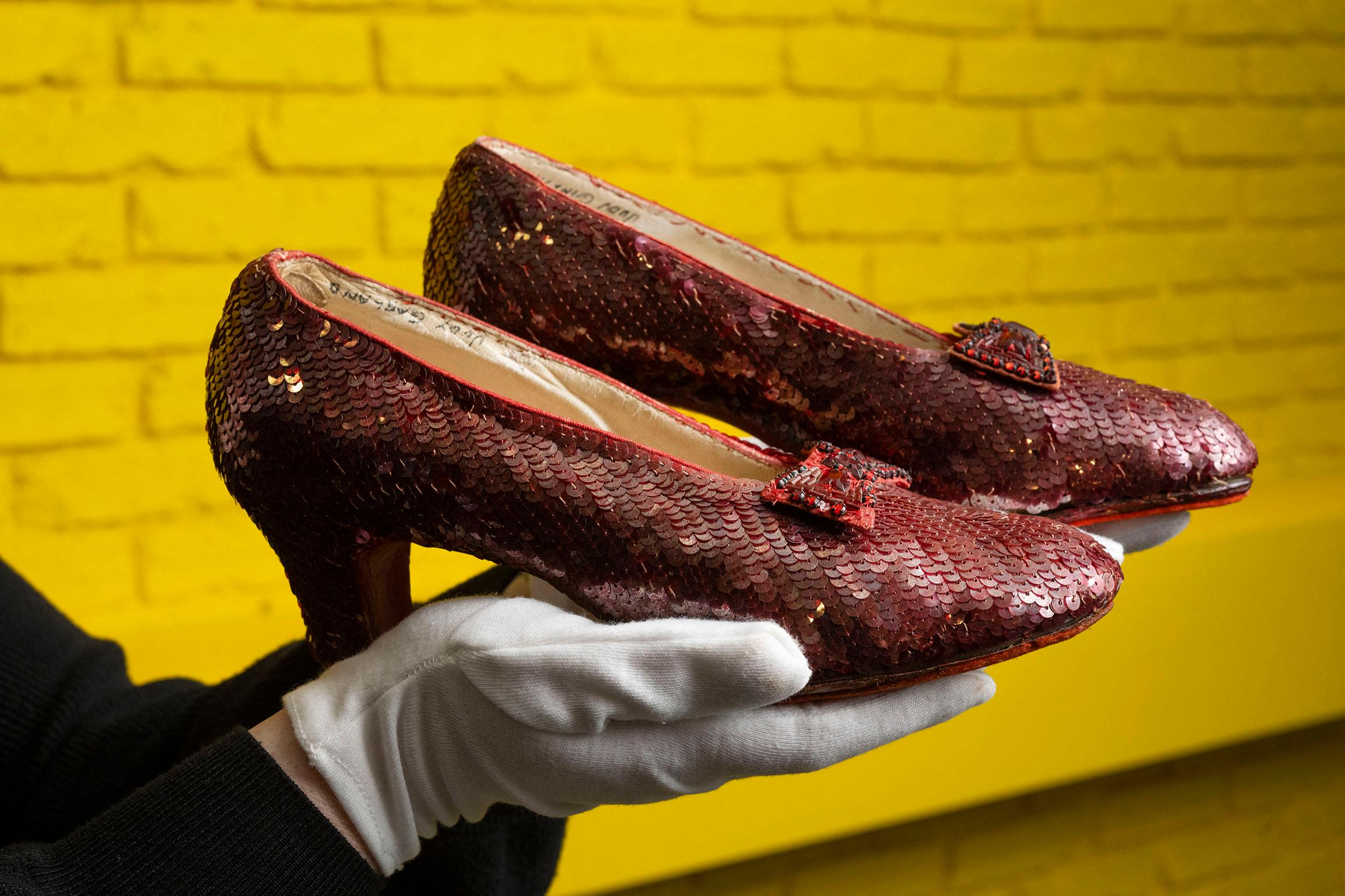 Dorothy's iconic once-stolen ruby slippers from the Wizard of Oz sell for a world record $$32.5 million!