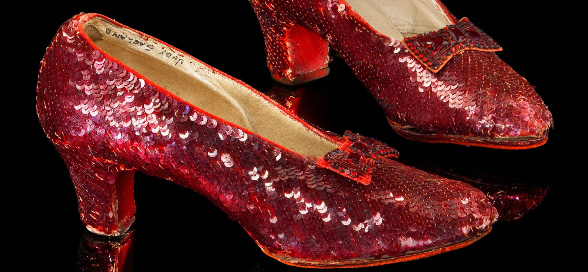 Dorothy's iconic once-stolen ruby slippers from the Wizard of Oz sell for a world record $$32.5 million