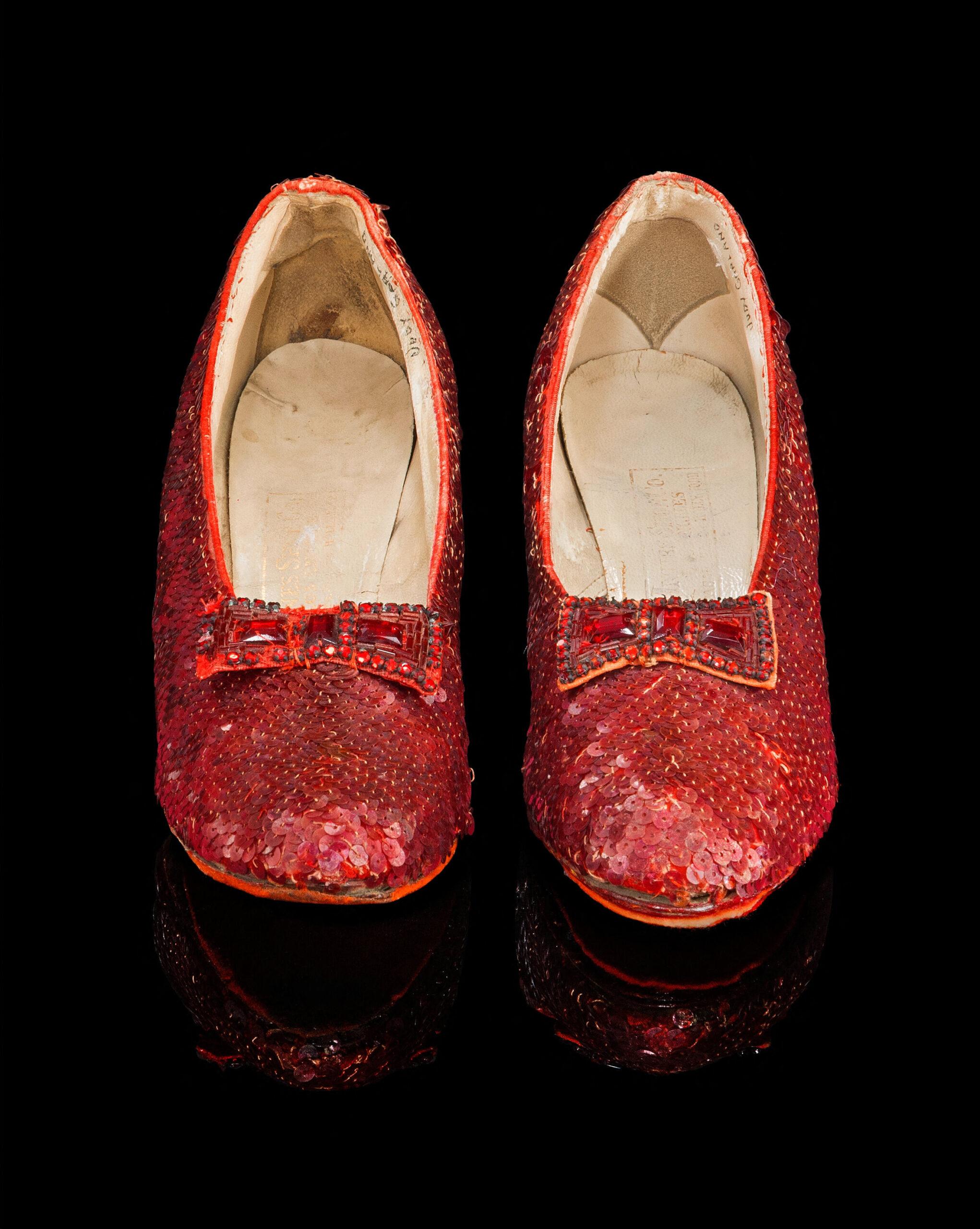 Dorothy's iconic once-stolen ruby slippers from the Wizard of Oz sell for a world record $$32.5 million