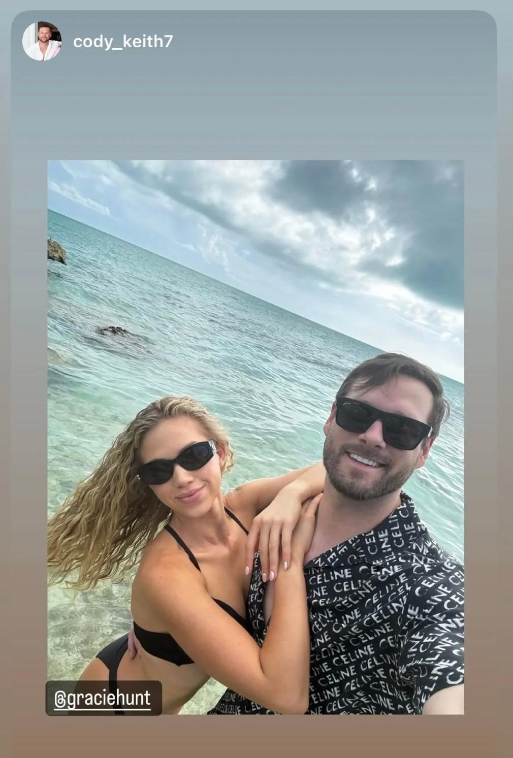 Gracie Hunt strikes a pose at the beach with boyfriend Cody Keith.