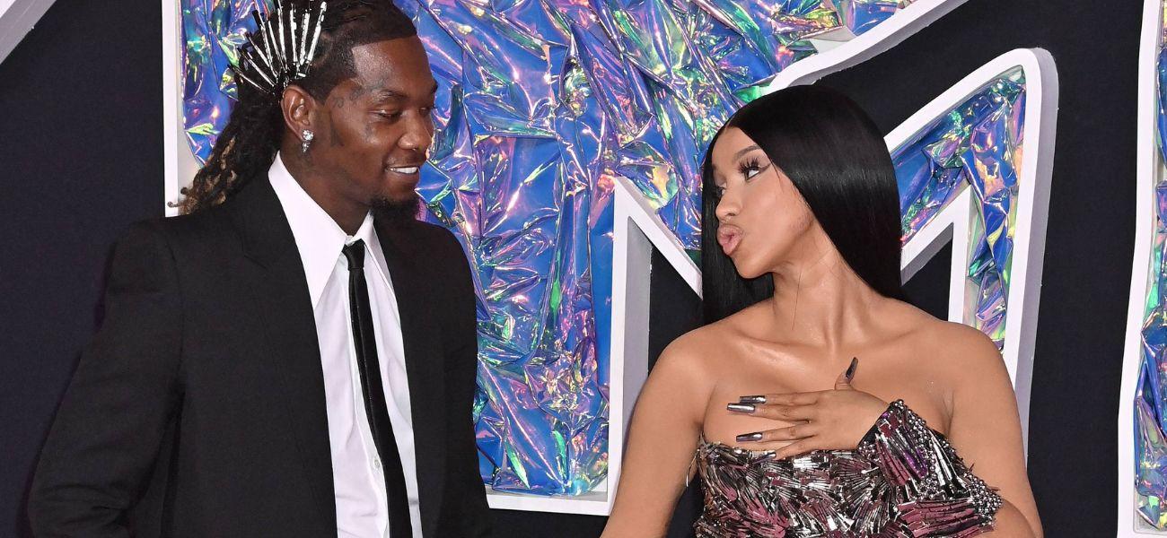 Cardi B and Offset look at each other at 2023 MTV VMAs