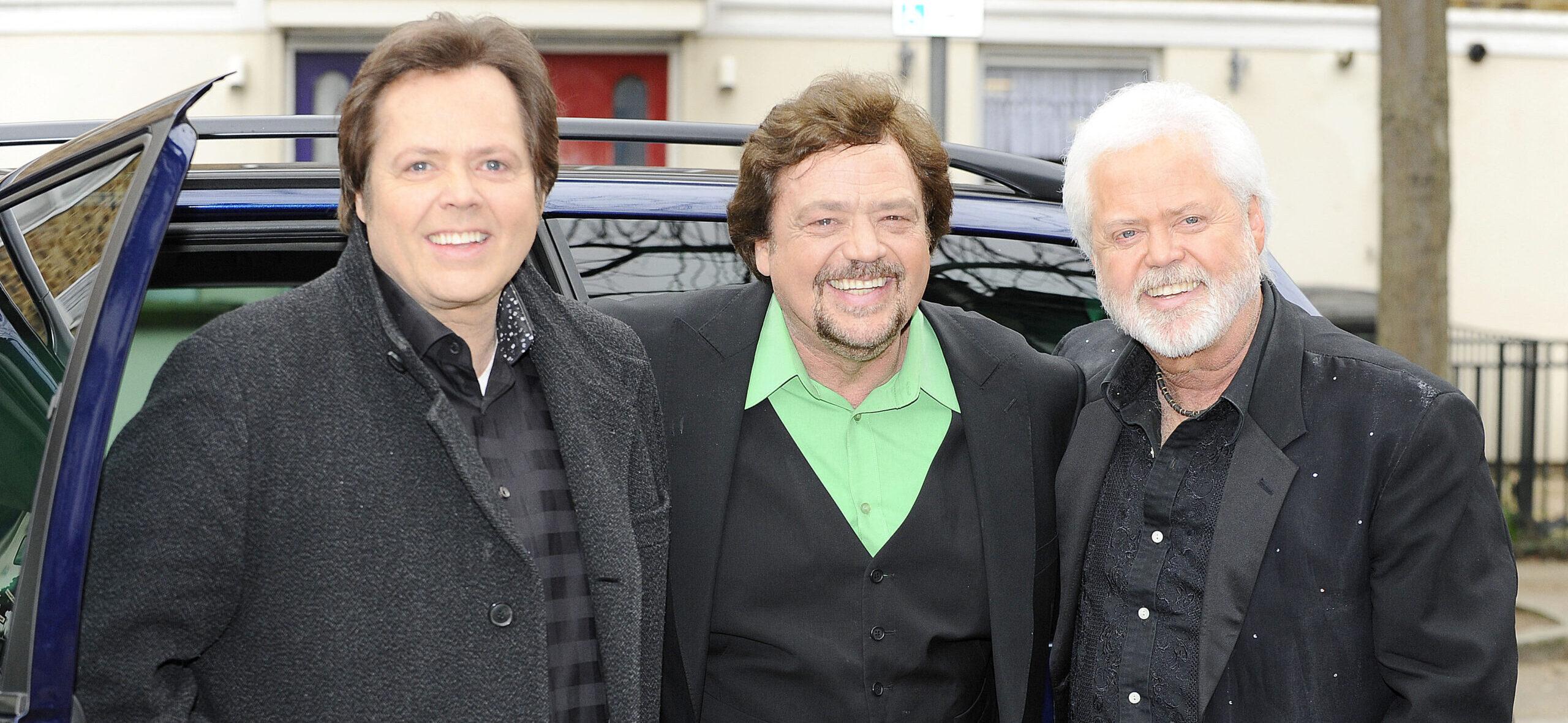 The Osmond Brothers smiling