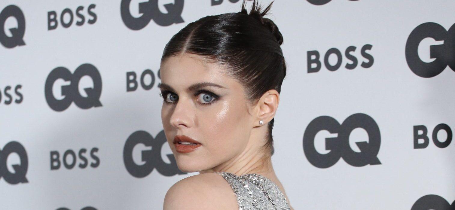 Alexandra Daddario Stuns In White Swimsuit While Lounging In Icy Waters