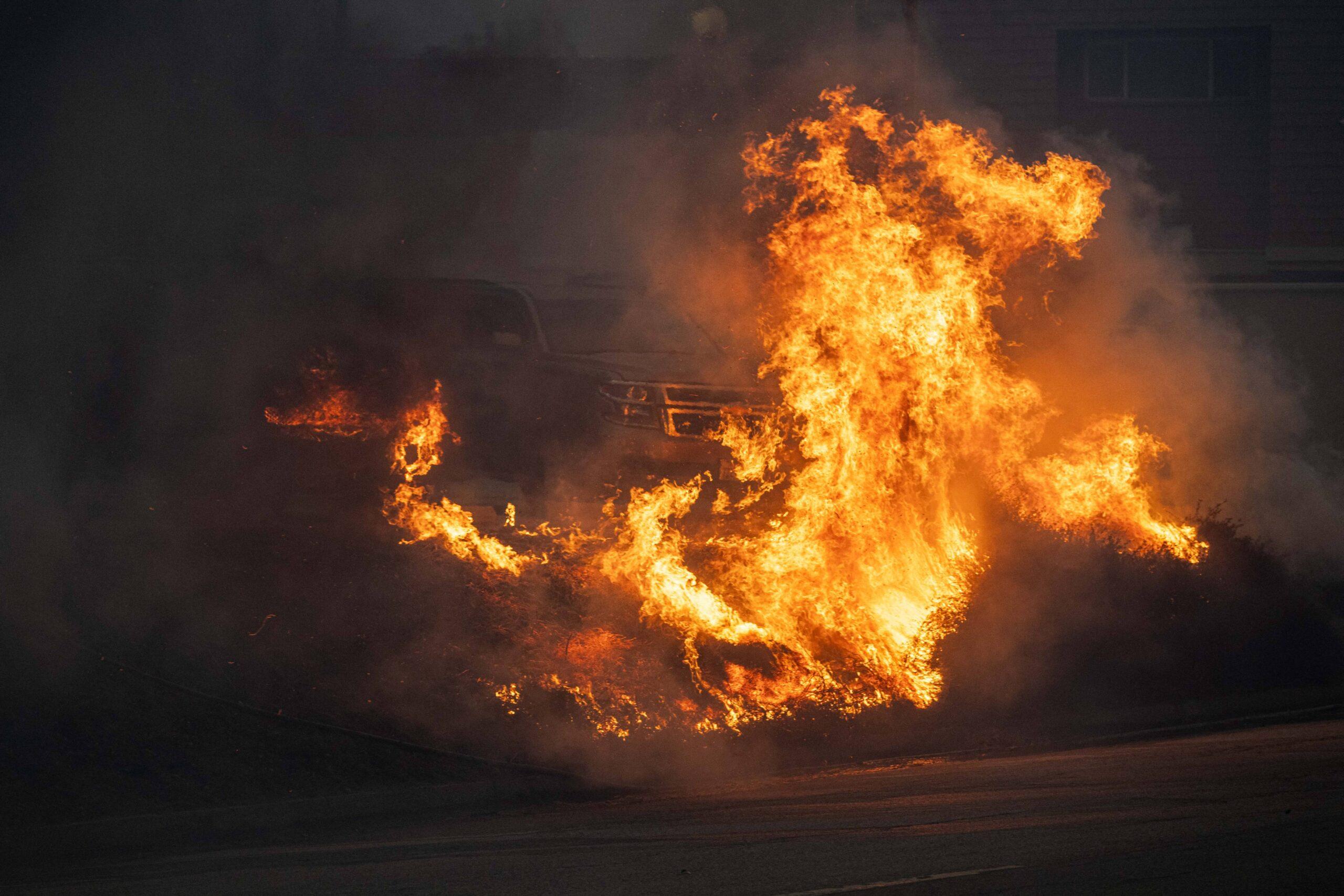 A Vehicle seen burning down during the Palisades Fire.