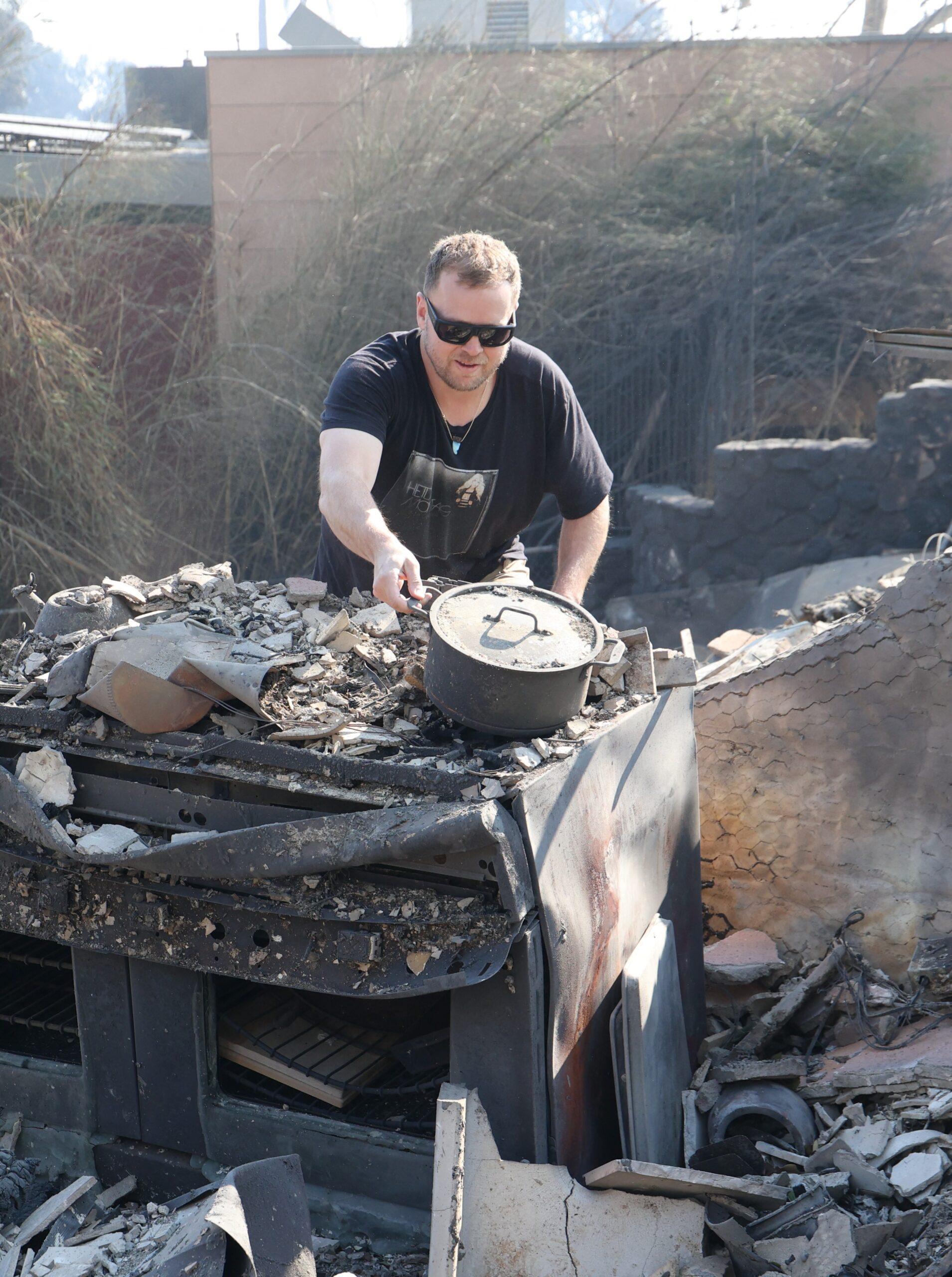 PREMIUM EXCLUSIVE: Spencer Pratt seen at his home which burned down trying to salvage crystals and any personal items in the devastating aftermath of his family loss