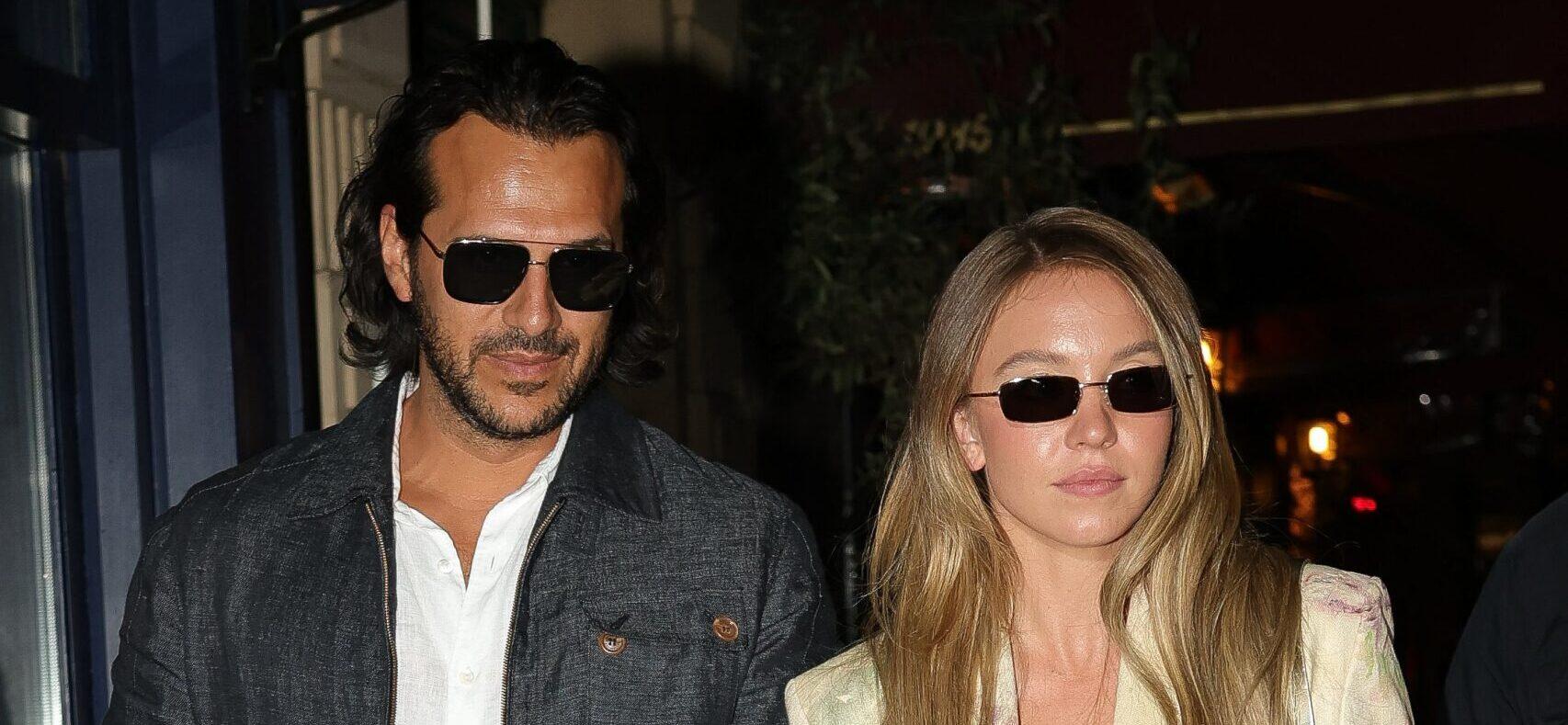 Sydney Sweeney and Jonathan Davino hand in hand after a romantic dinner in an Italian restaurant in Paris