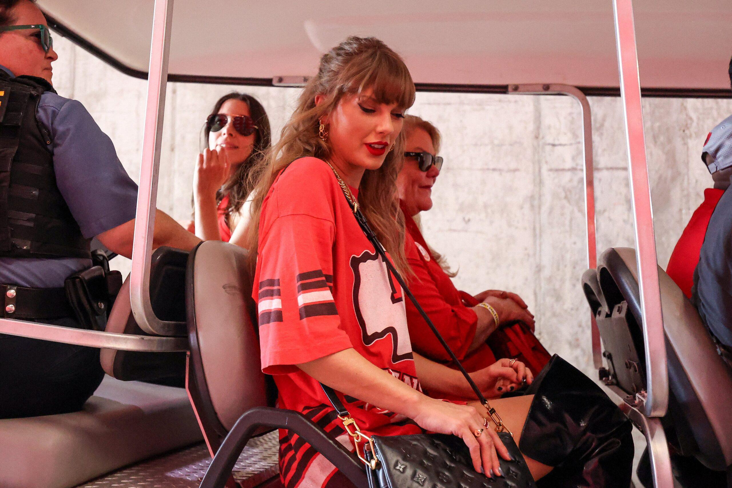 Taylor Swift in golf cart At Bengals vs Chiefs NFL Game