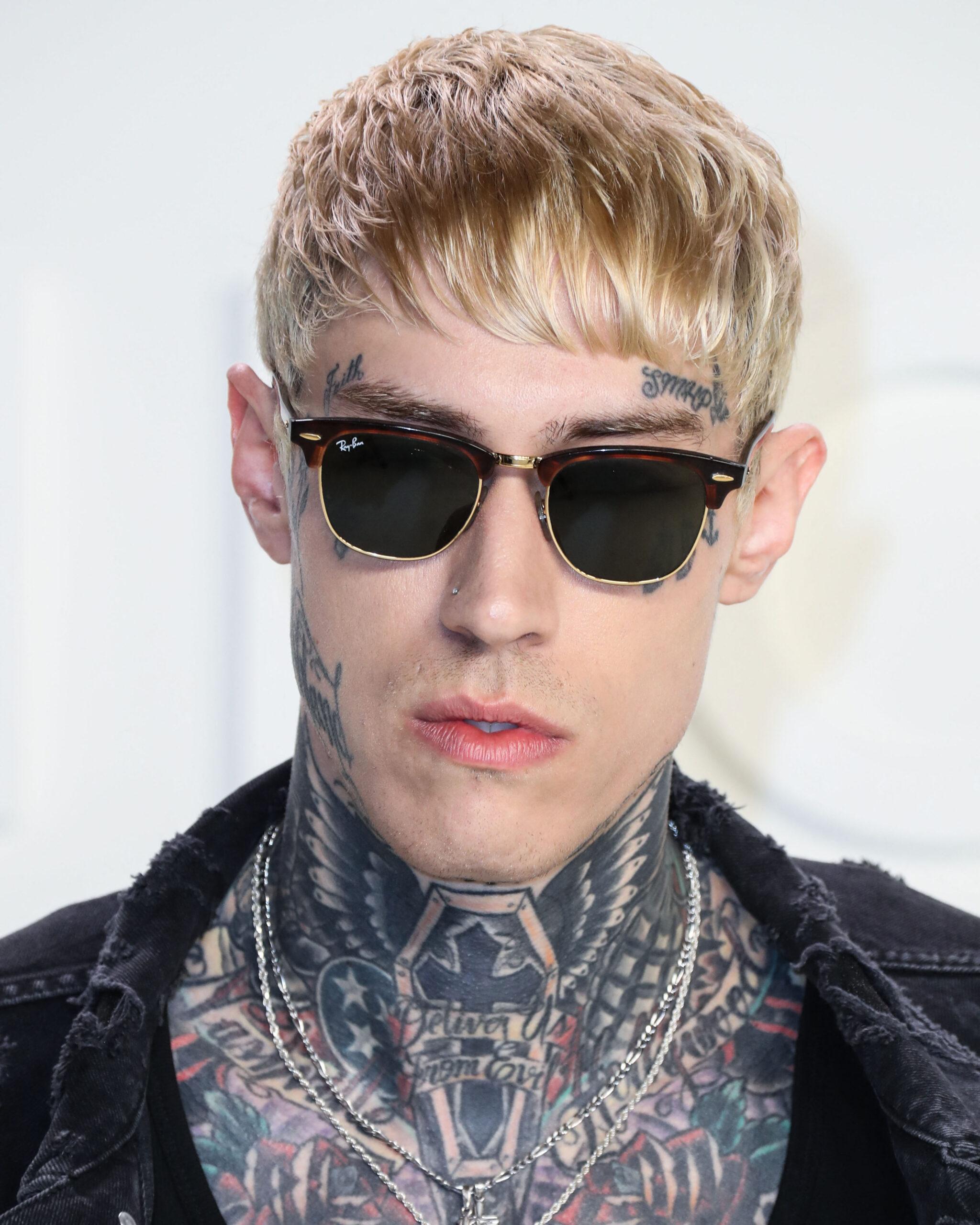 Trace Cyrus wearing sunglasses