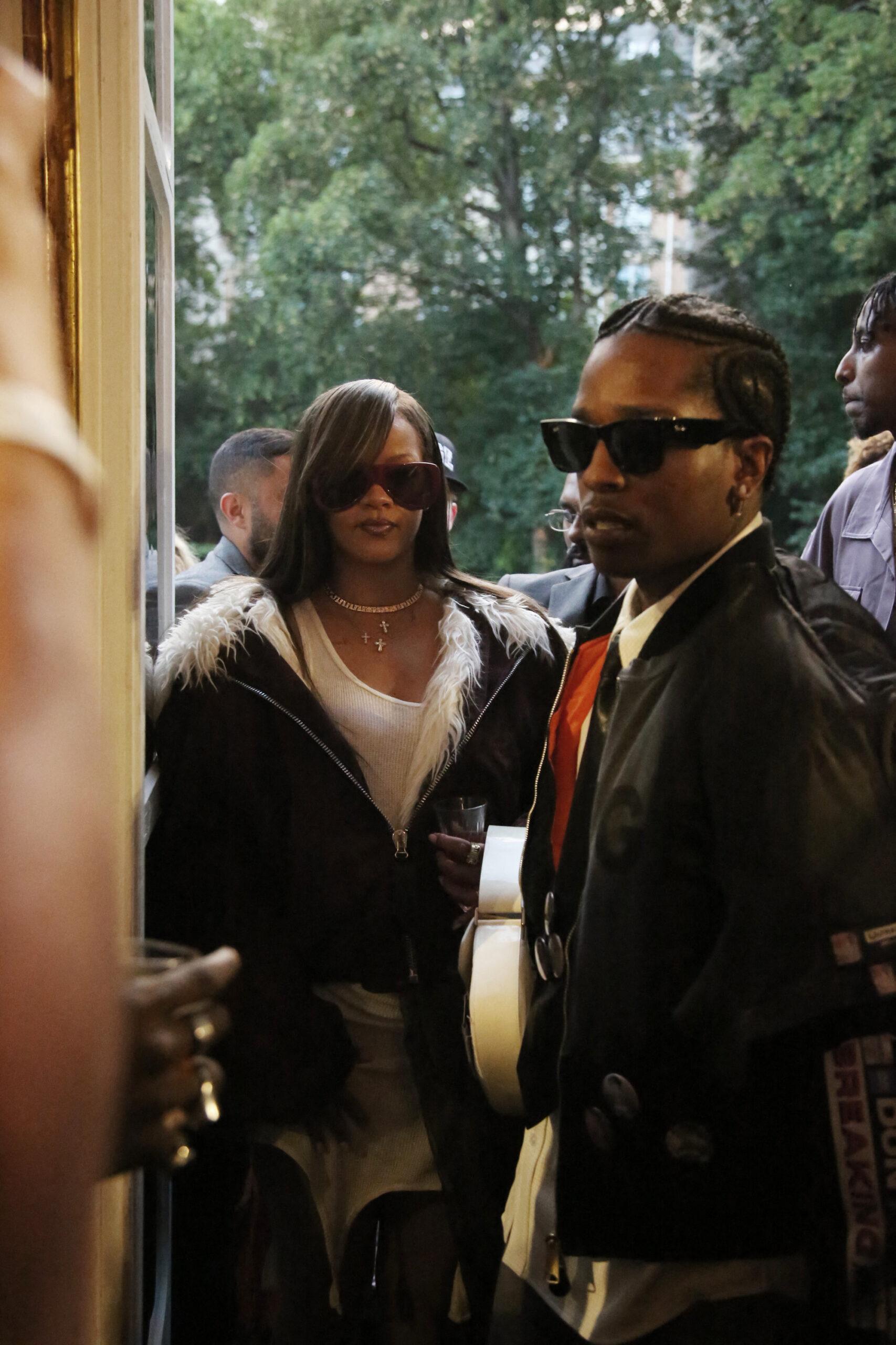 Rihanna attends partner A$AP Rocky's menswear show during Paris Fashion Week