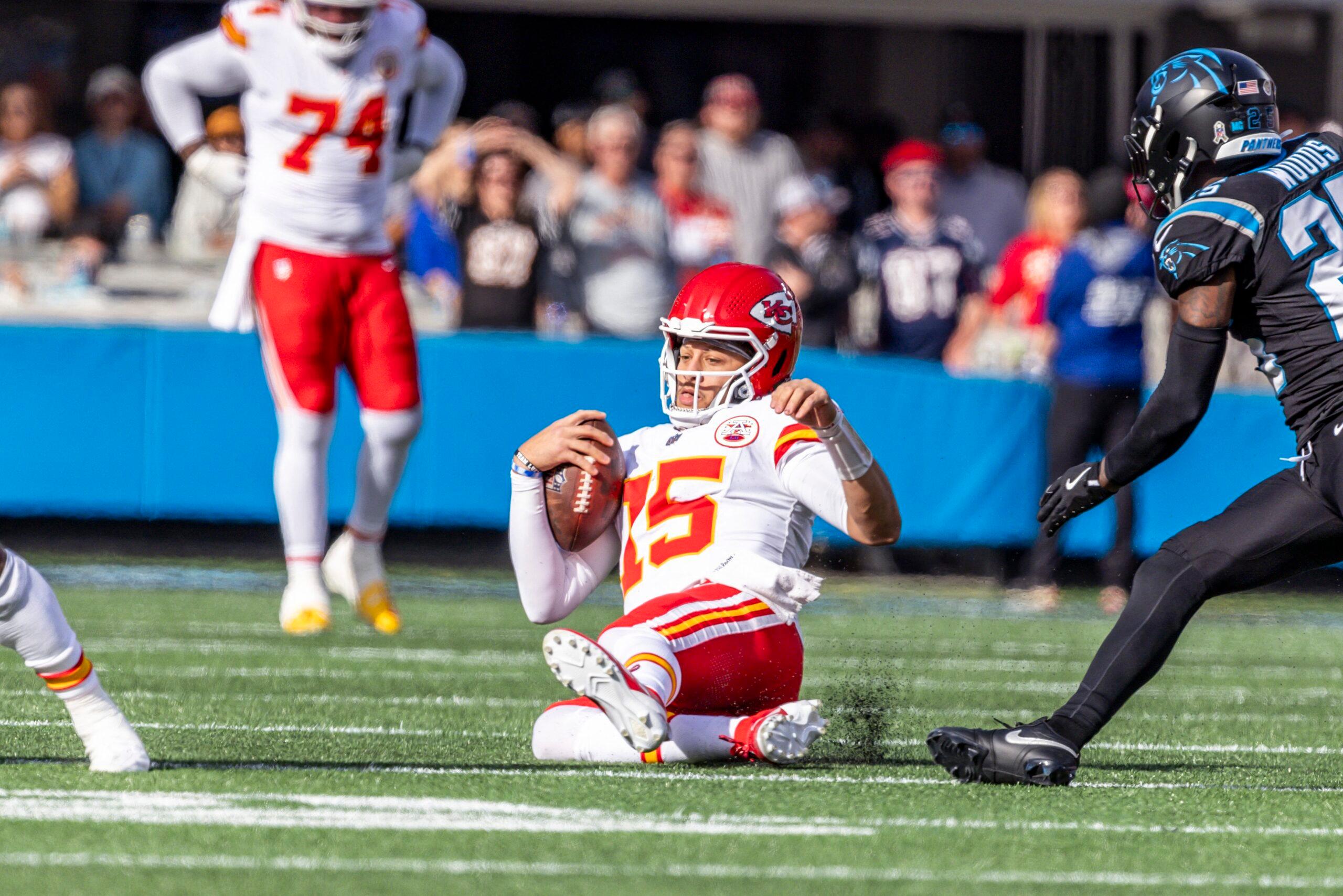 Patrick Mahomes sliding on the NFL field